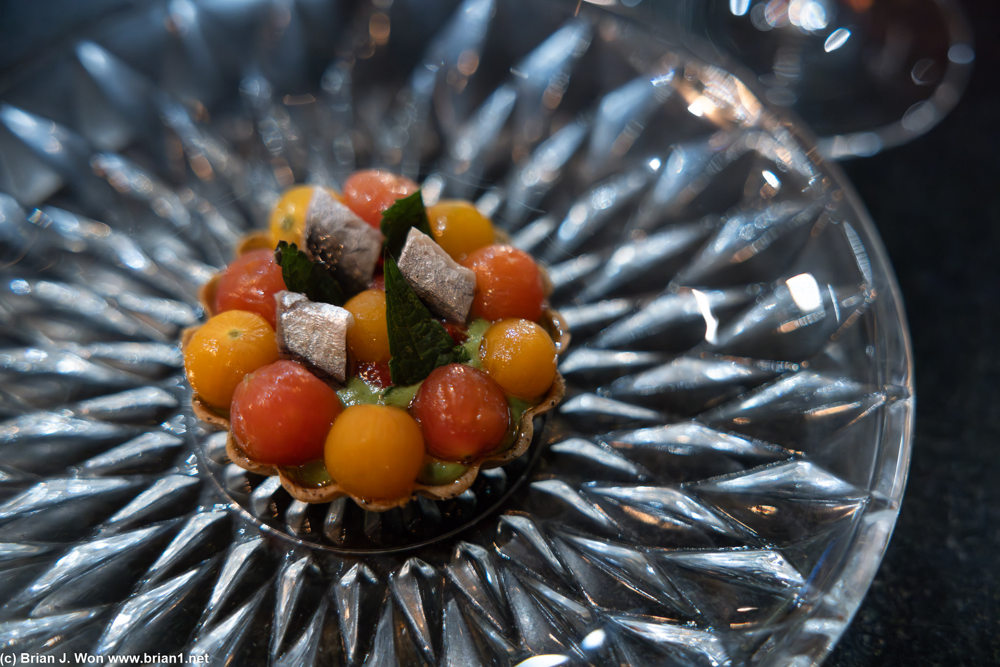 Victor Munak tomatoes, boqueron, pipian, seaweed tartlet. (anchovy)