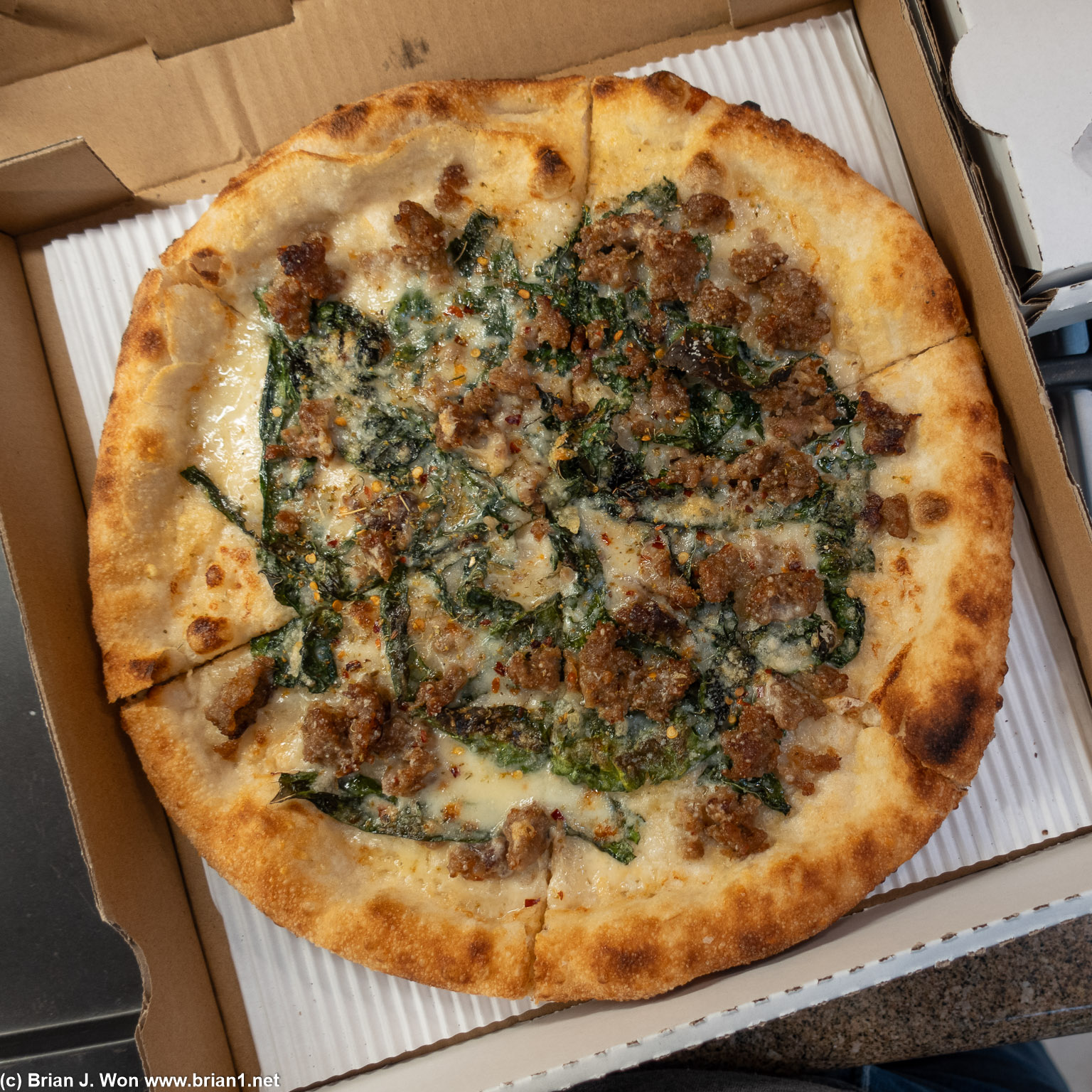 Kale and sausage from Fiorelli Pizza. Not good.