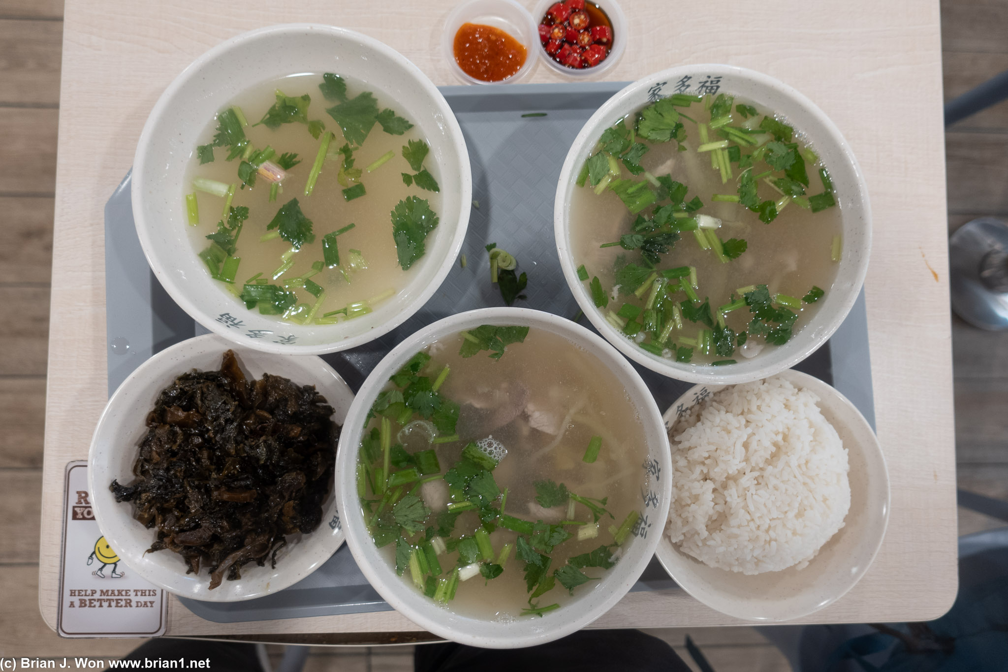 Pork meat, pork organ meat, plain broth, pickled veggies, rice.