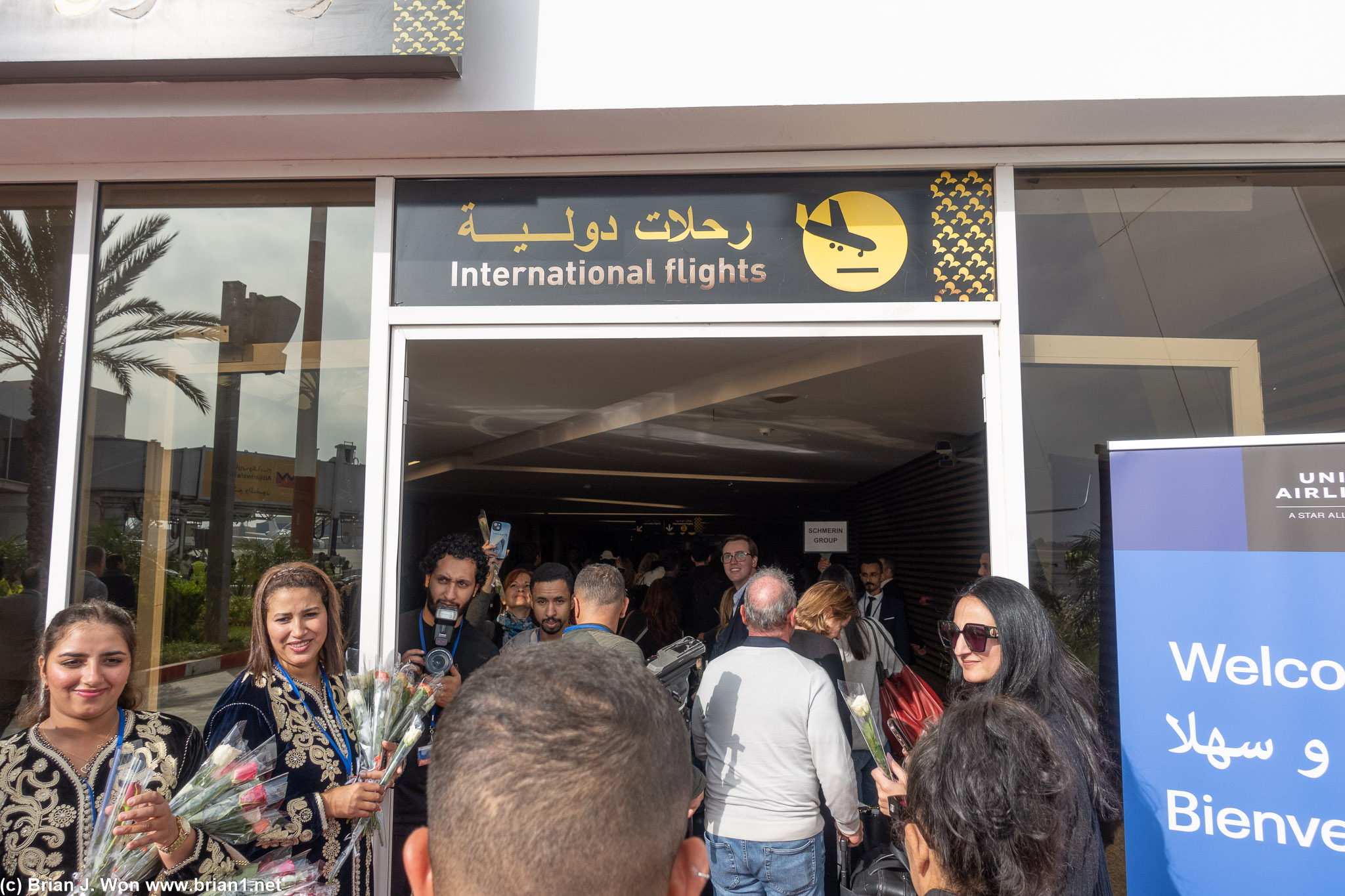 Celebration continues inside the terminal.