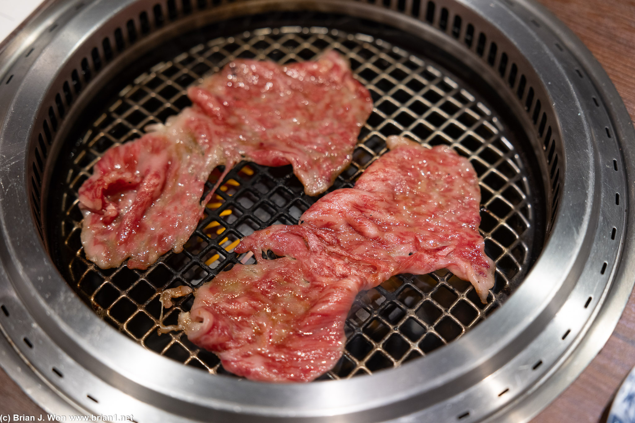 Marinated sirloin on the grill.