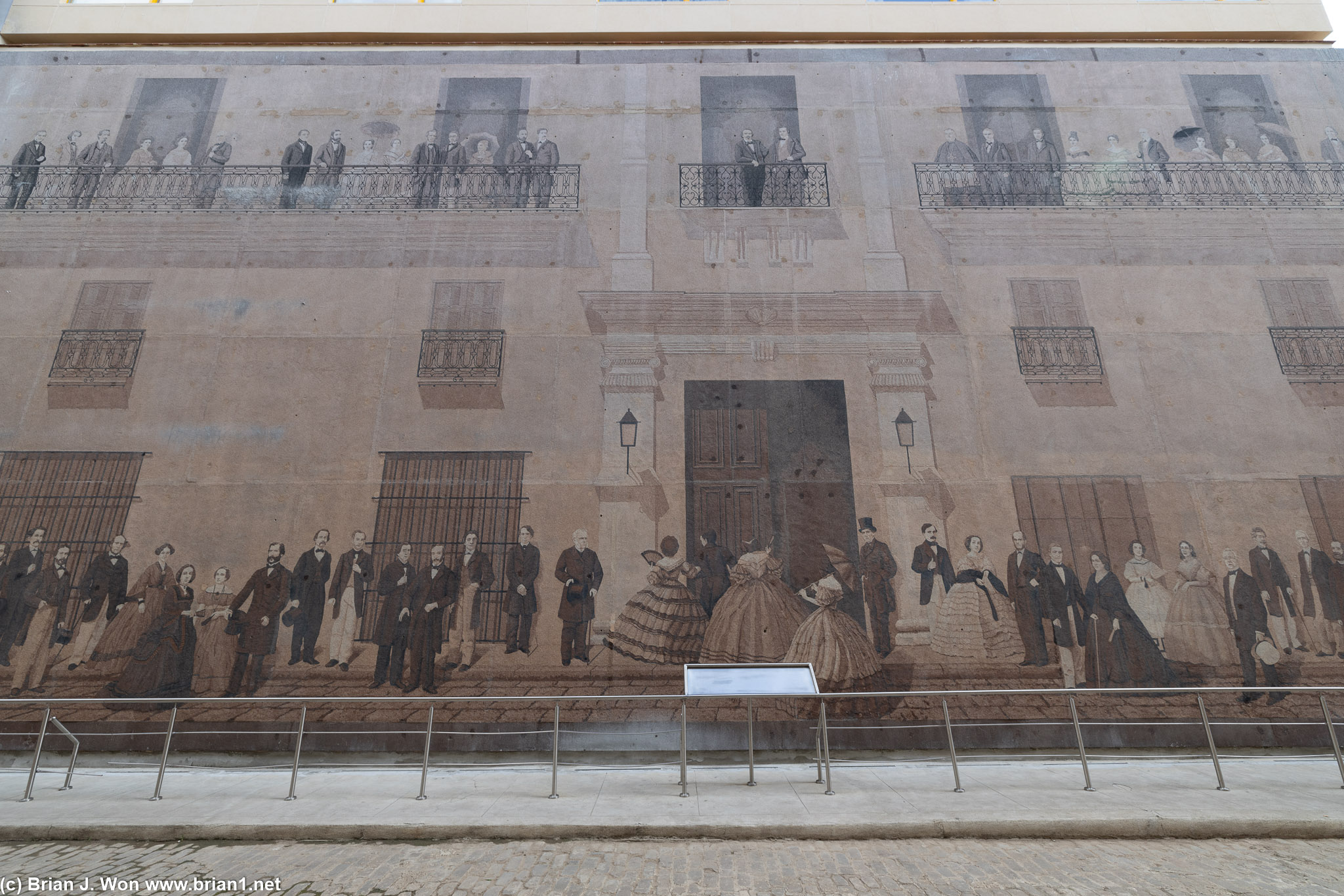 Elaborately painted wall of famous figures in Cuban history.