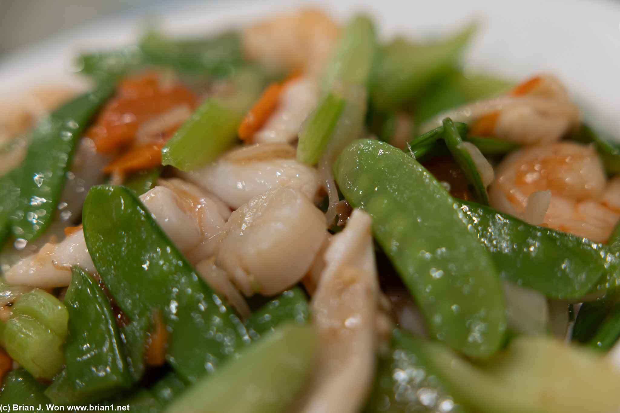 Seafood and snow peas.