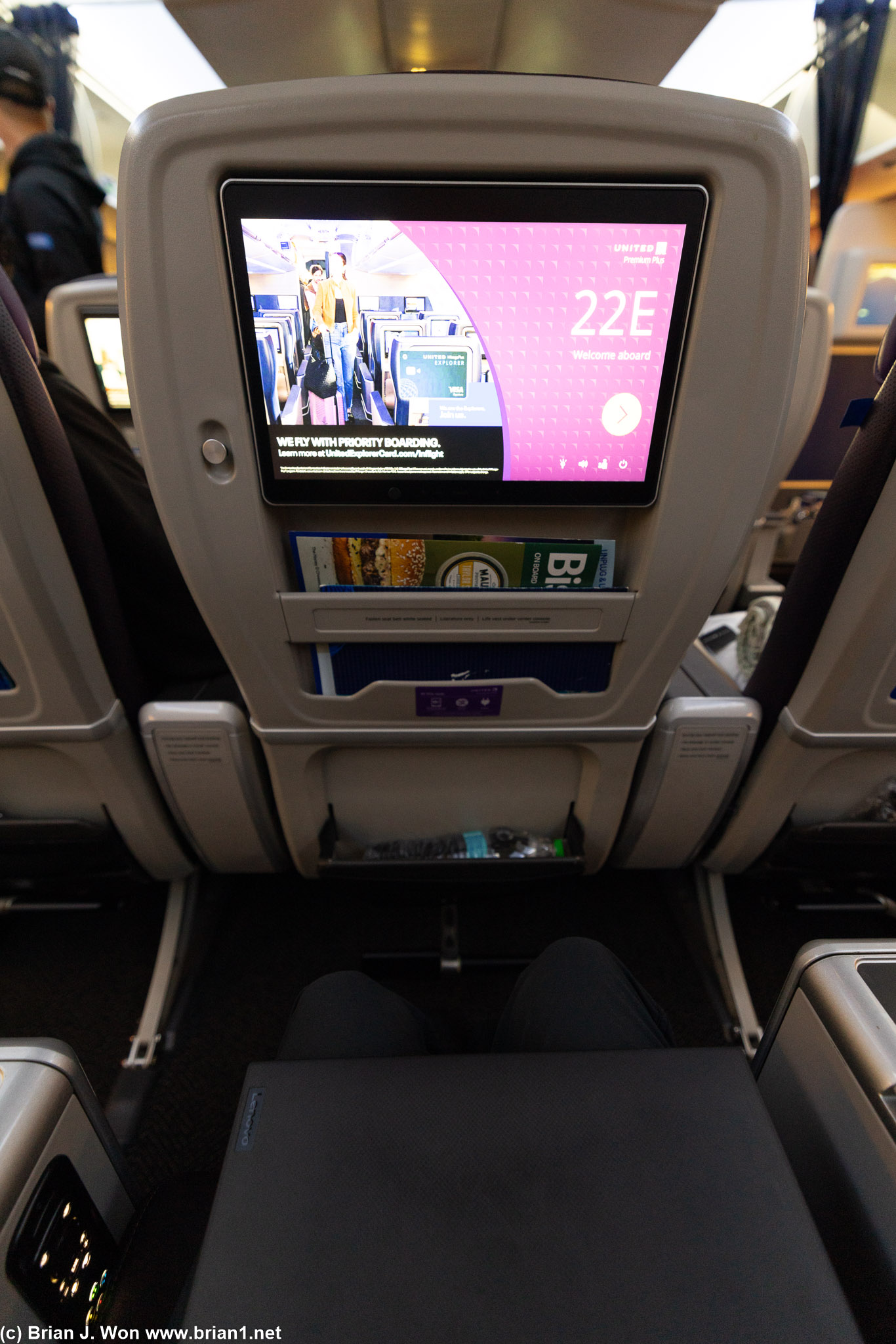 In row 22 there's no one behind you, so you can recline as much as the seat will allow without feeling bad.