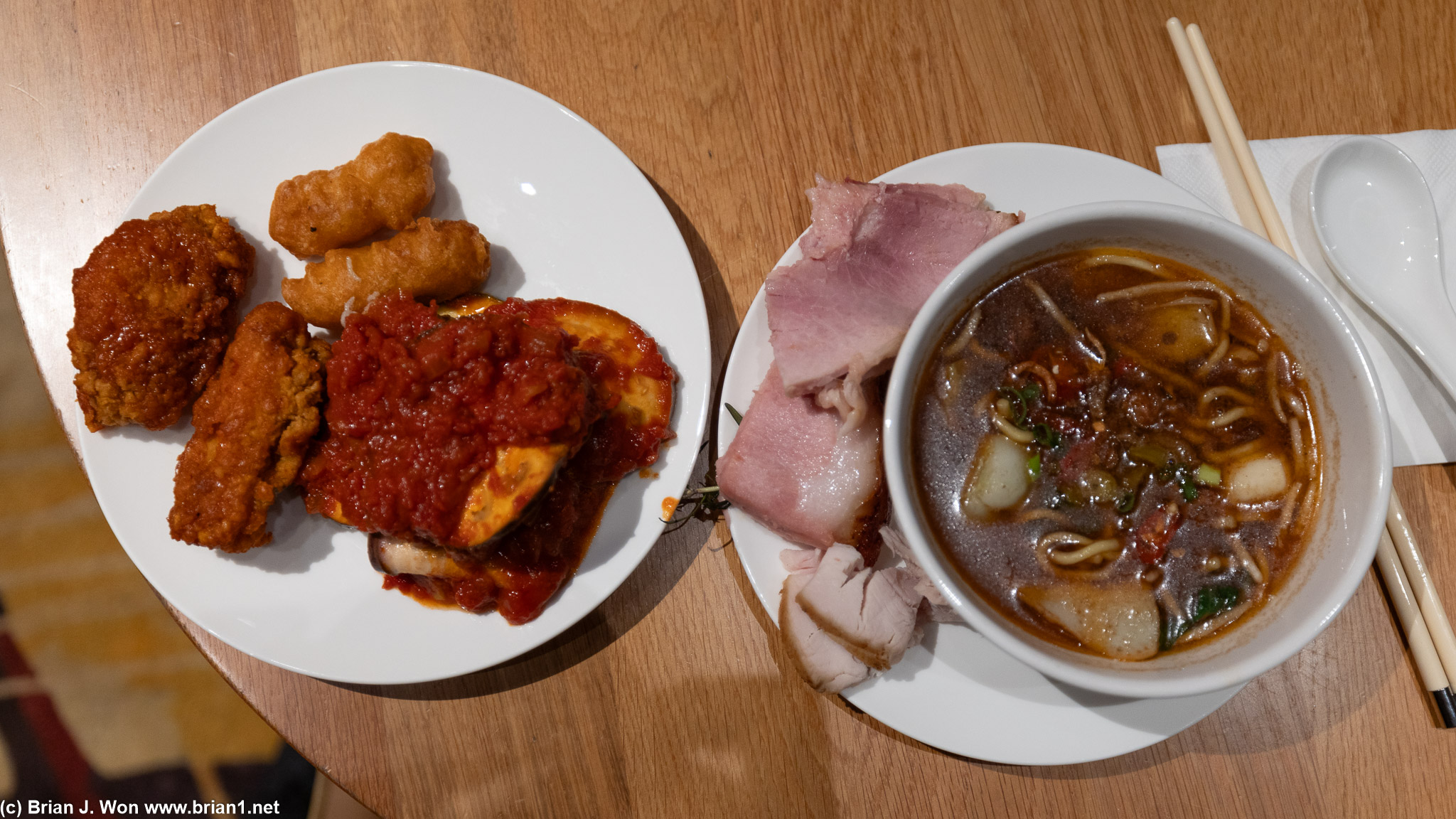 Fried fish, chicken wings, ham, turkey, tom yum noodle soup for Christmas.