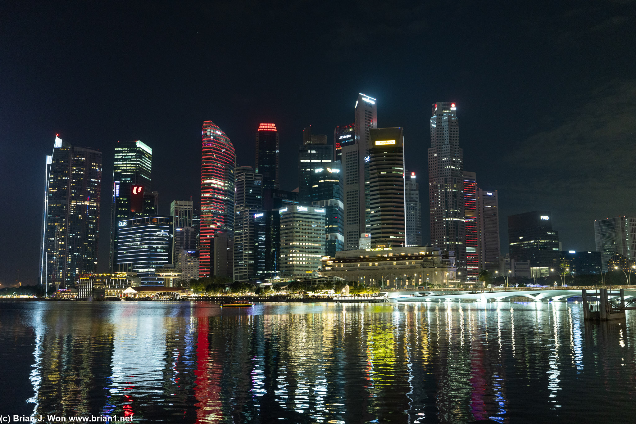 Many tall buildings on the west side of Marina Bay.