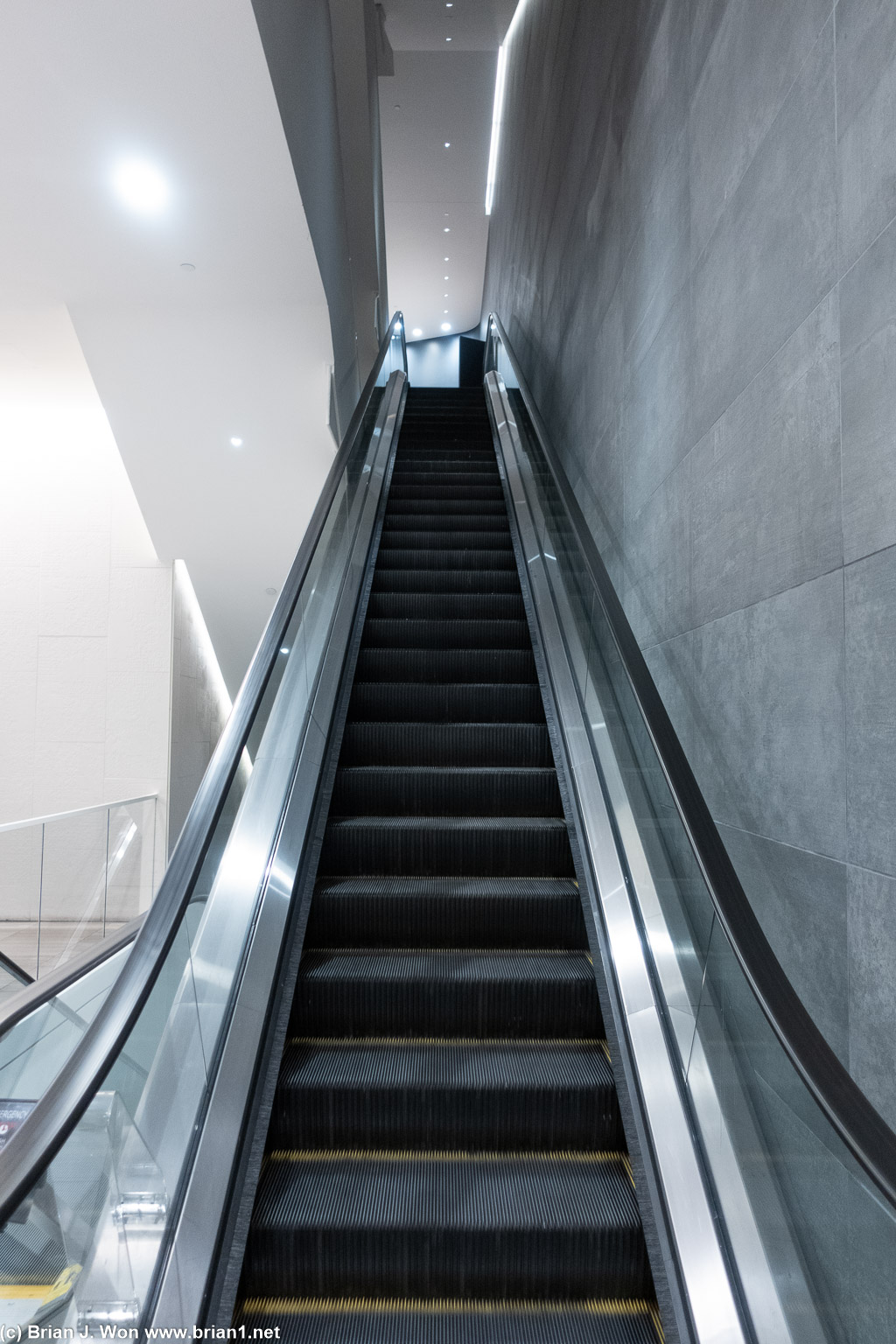 Up the escalator.