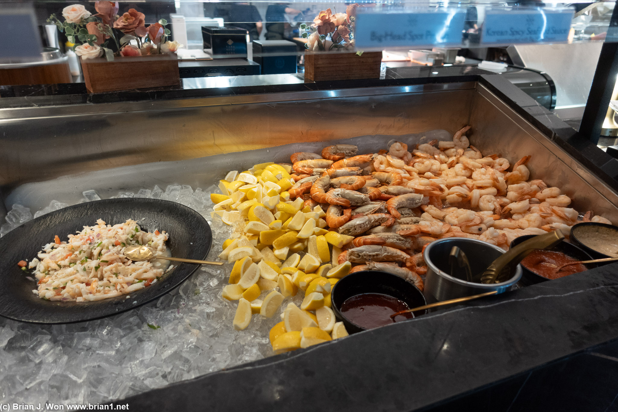 Big head spot prawns and cocktail shrimp, all next to ceviche.