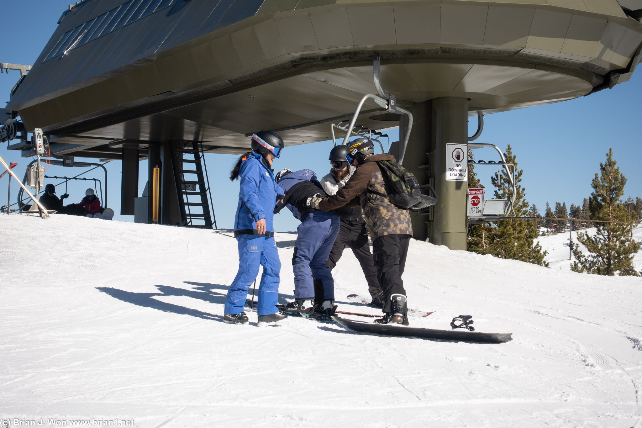 Ski instructor and two other guests helped him up.