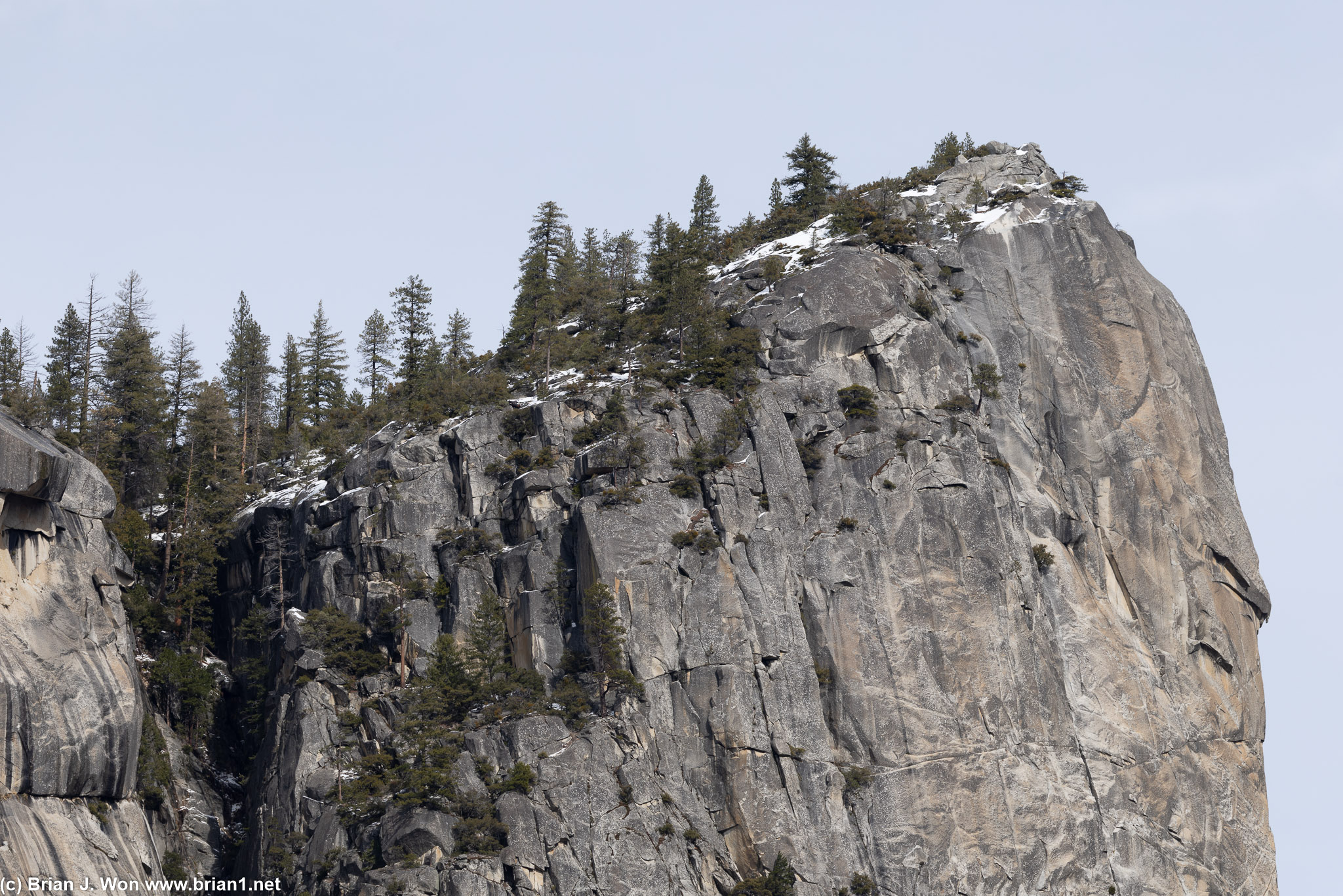 To the left of Half Dome.