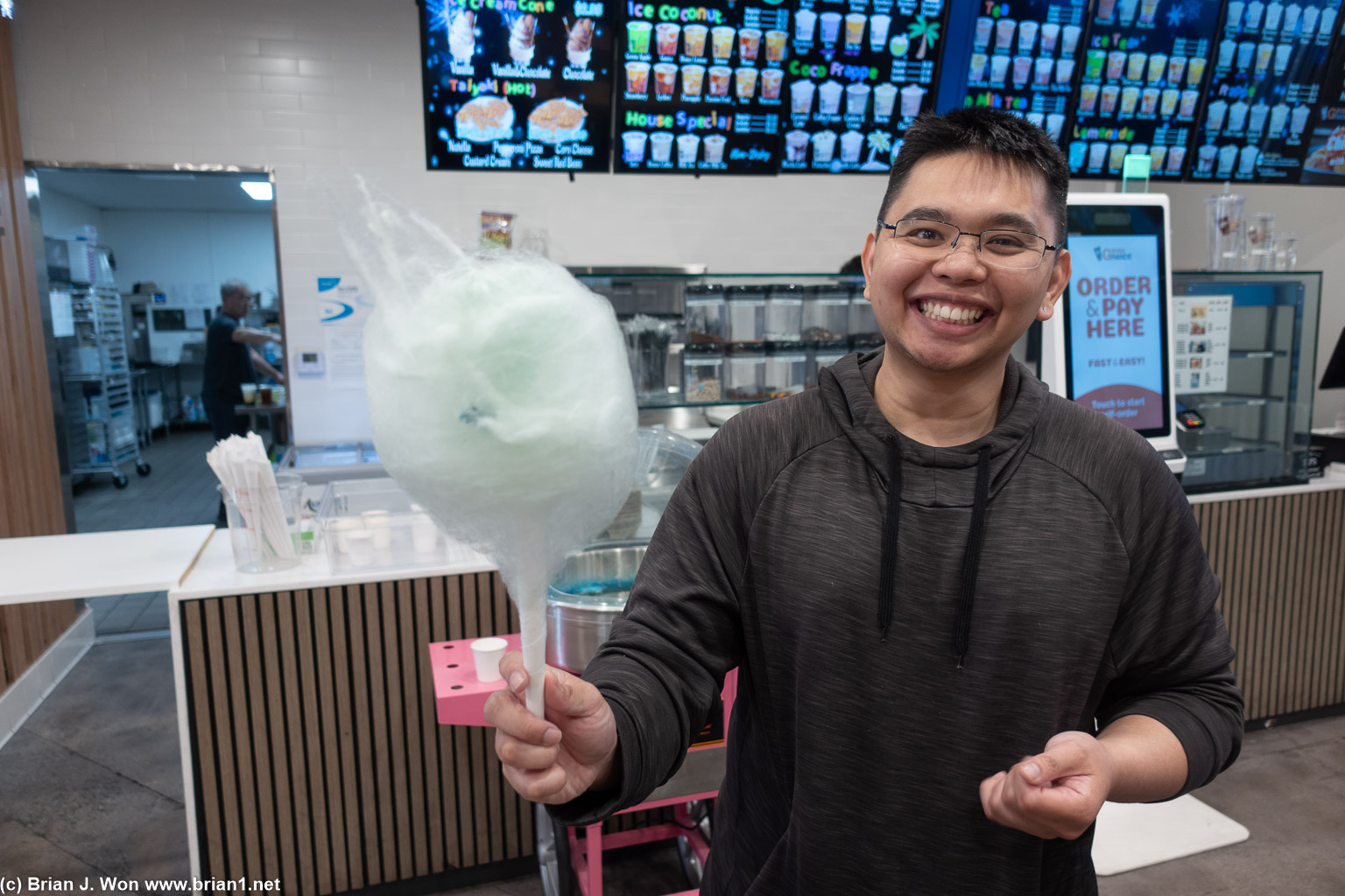 Proud of his cotton candy, too.