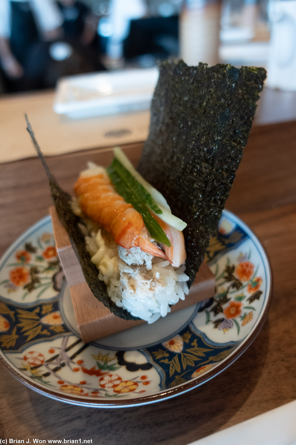 Signature hand roll is shrimp, blue crab, imitation crab (?), cucumber.