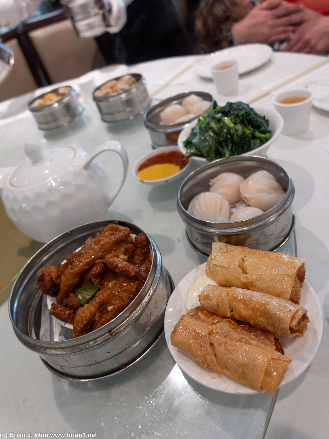 Feng zhao (chicken feet), bean curd rolls, har gow, gai lan.