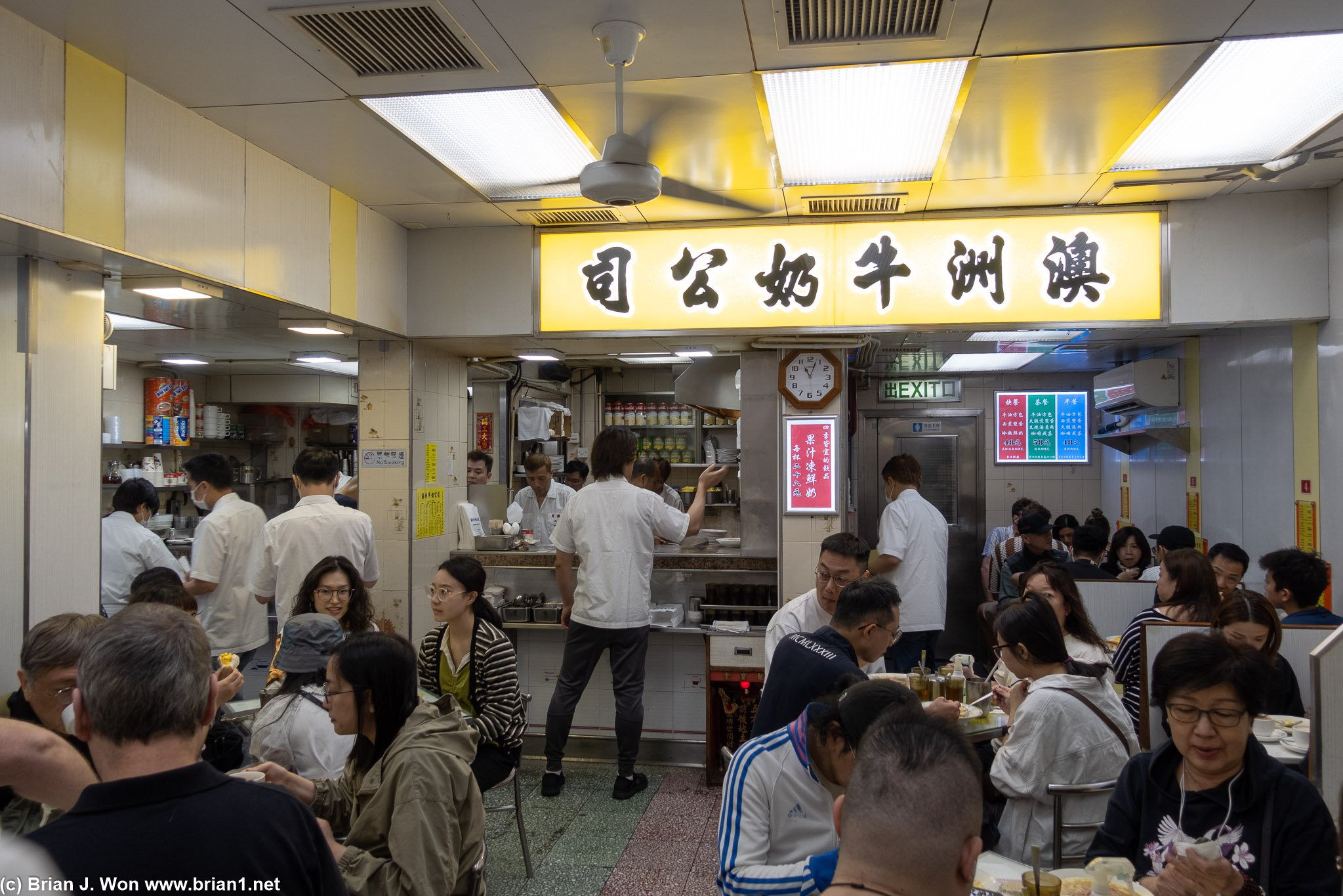 Inside. Sit down, order, eat, don't linger.