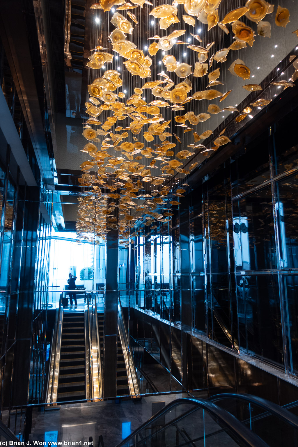Escalators to the International Commerce Centre's attached mall, Elements.