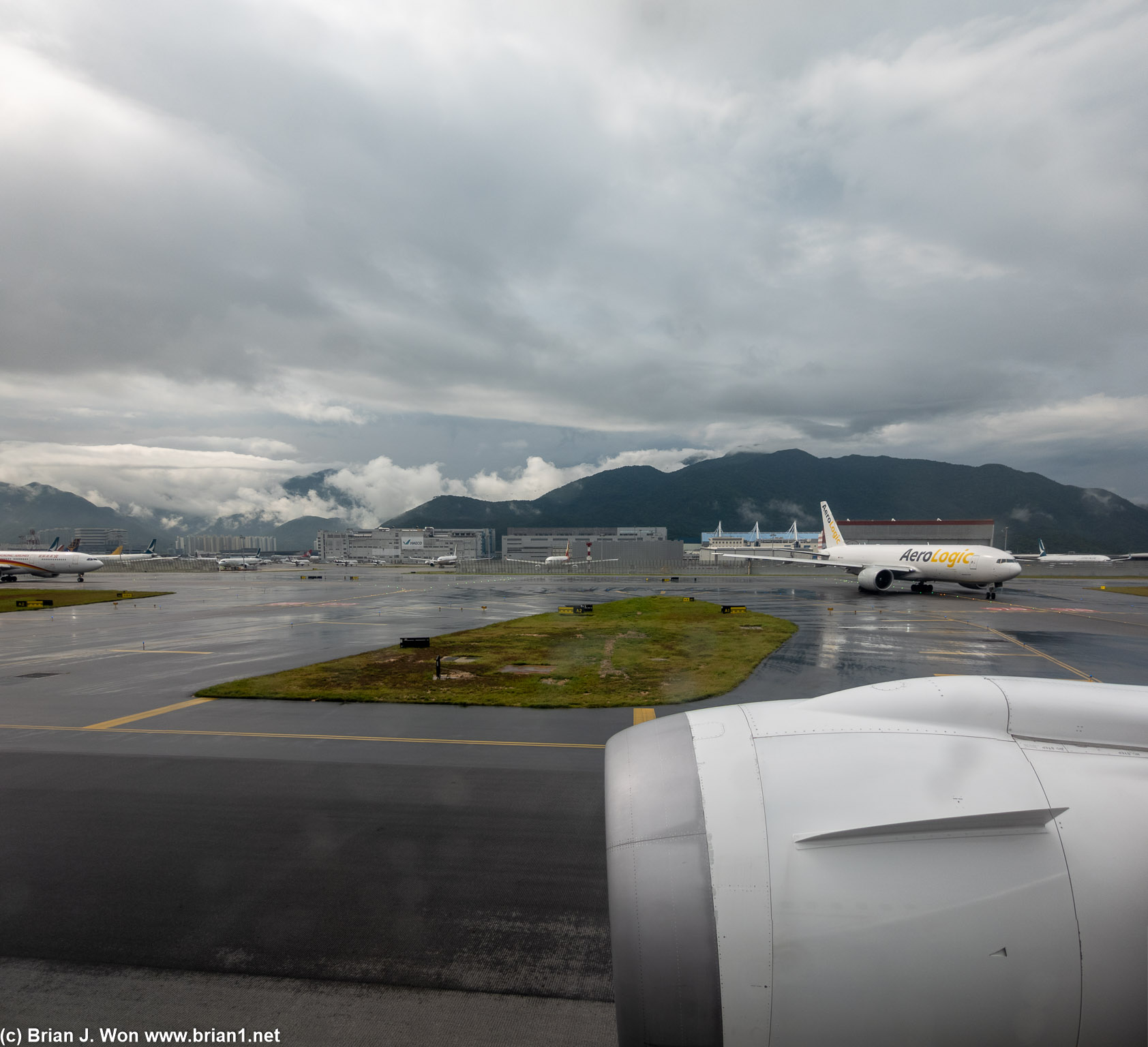 Big airplanes under dramatic skies.