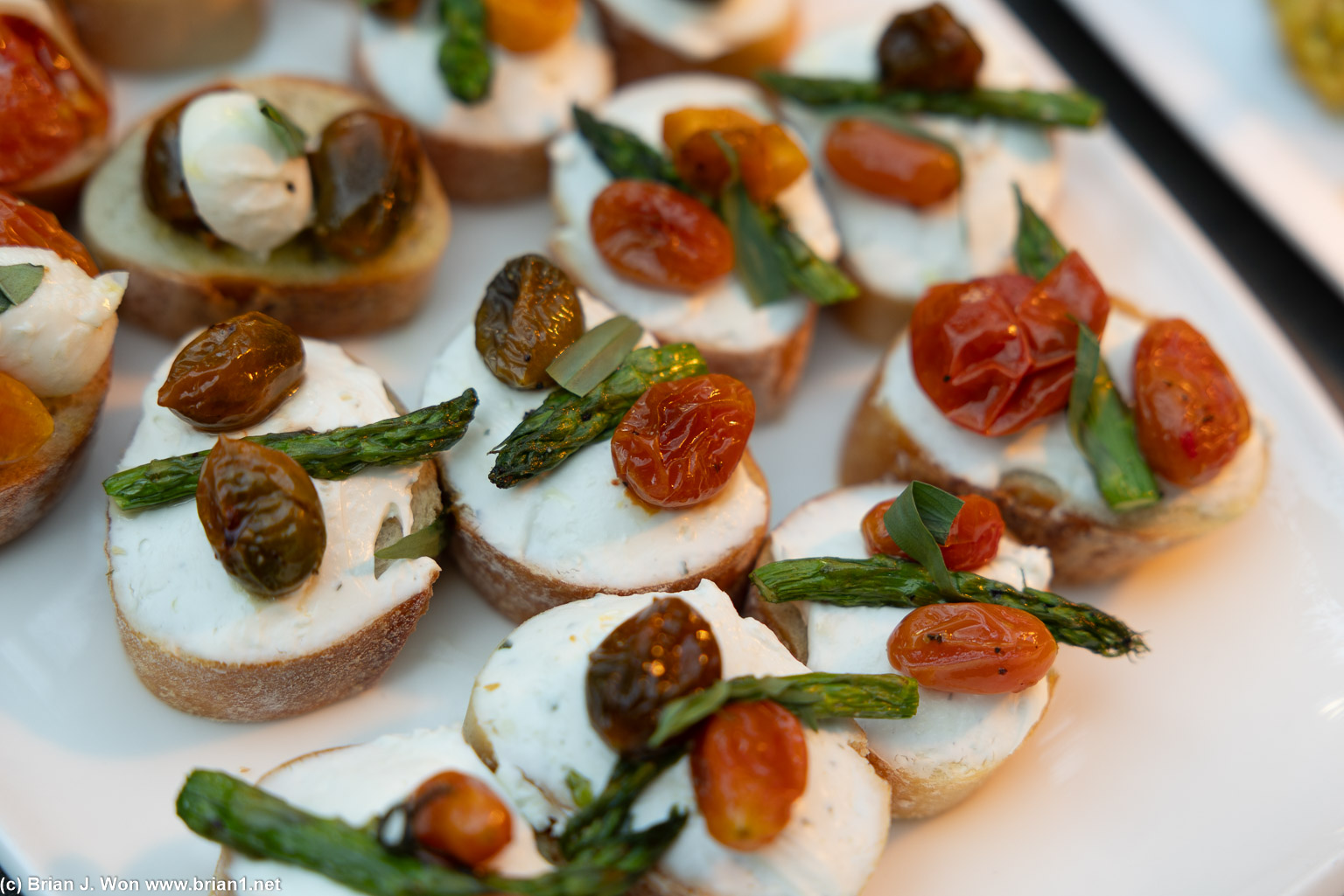 Cream cheese, asparagus, tomato, olive.