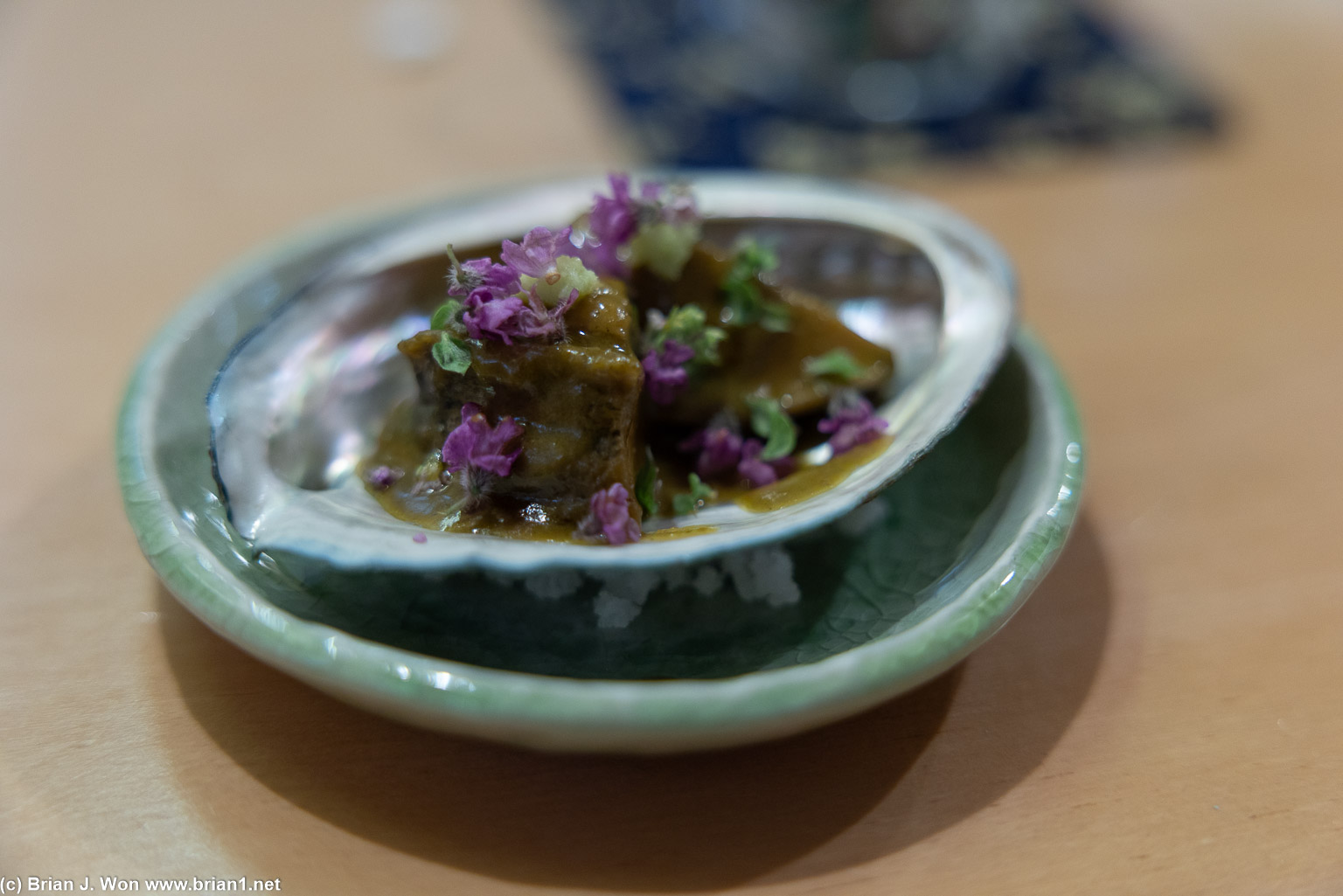 Black abalone from Jeju island with its own liver, shisho blossom.