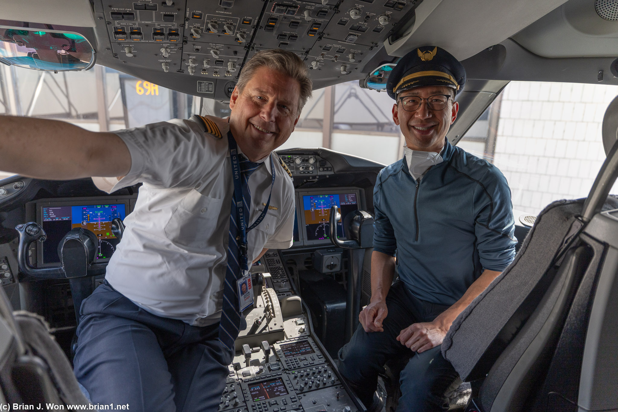 Captain John loves giving cockpit tours-- he let in a bunch more passengers after us.