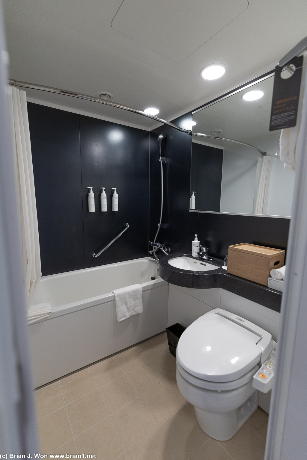 Bathroom is equally small but has a proper tub.
