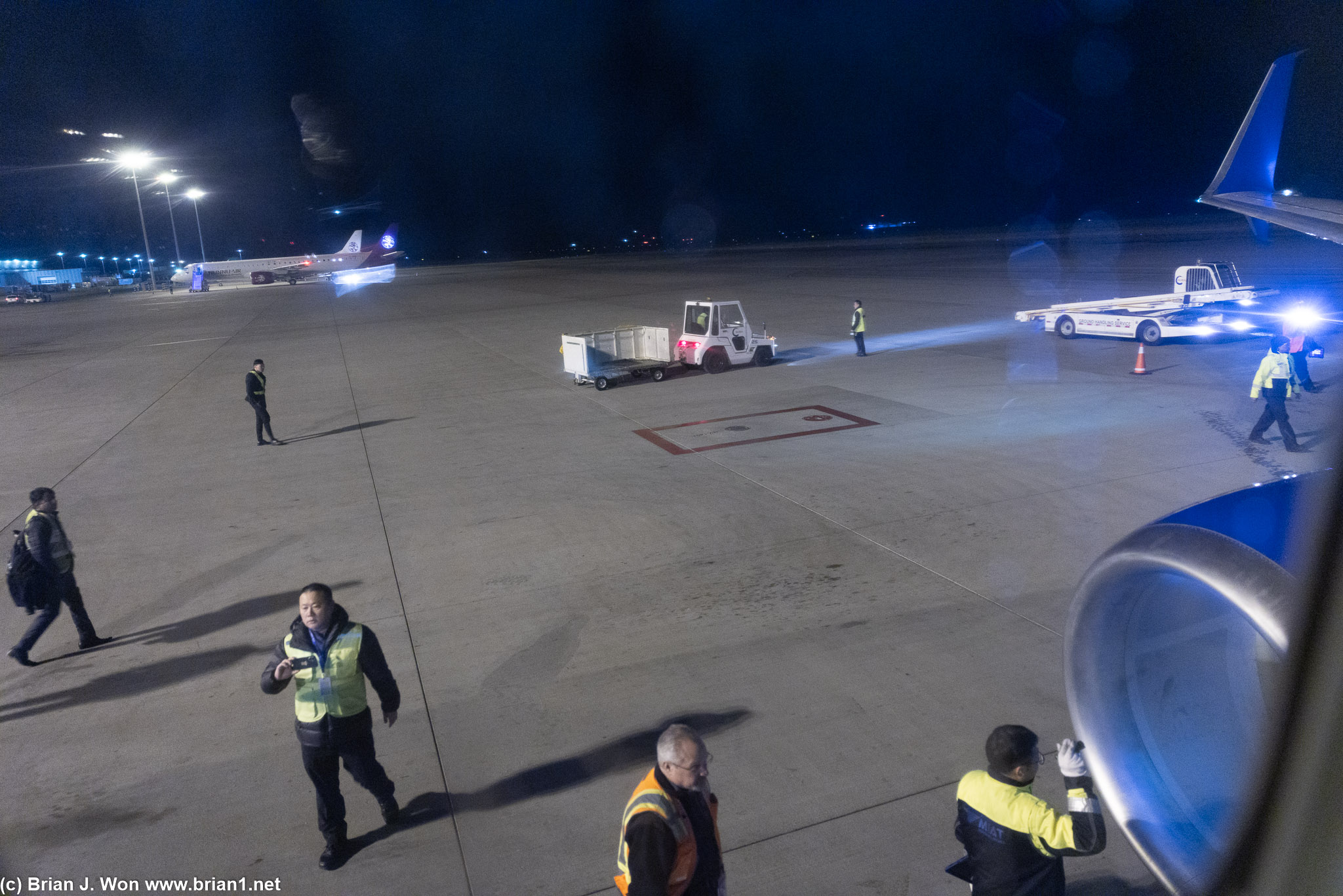 Lots of ground crew to fuss over this old 737-800.