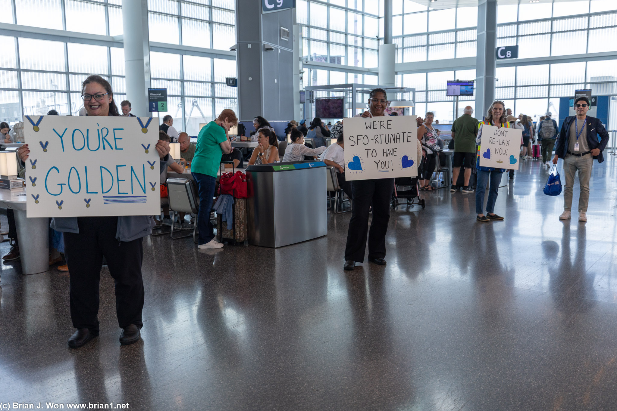 They lined up from our arrival gate to our departure gate to welcome us.