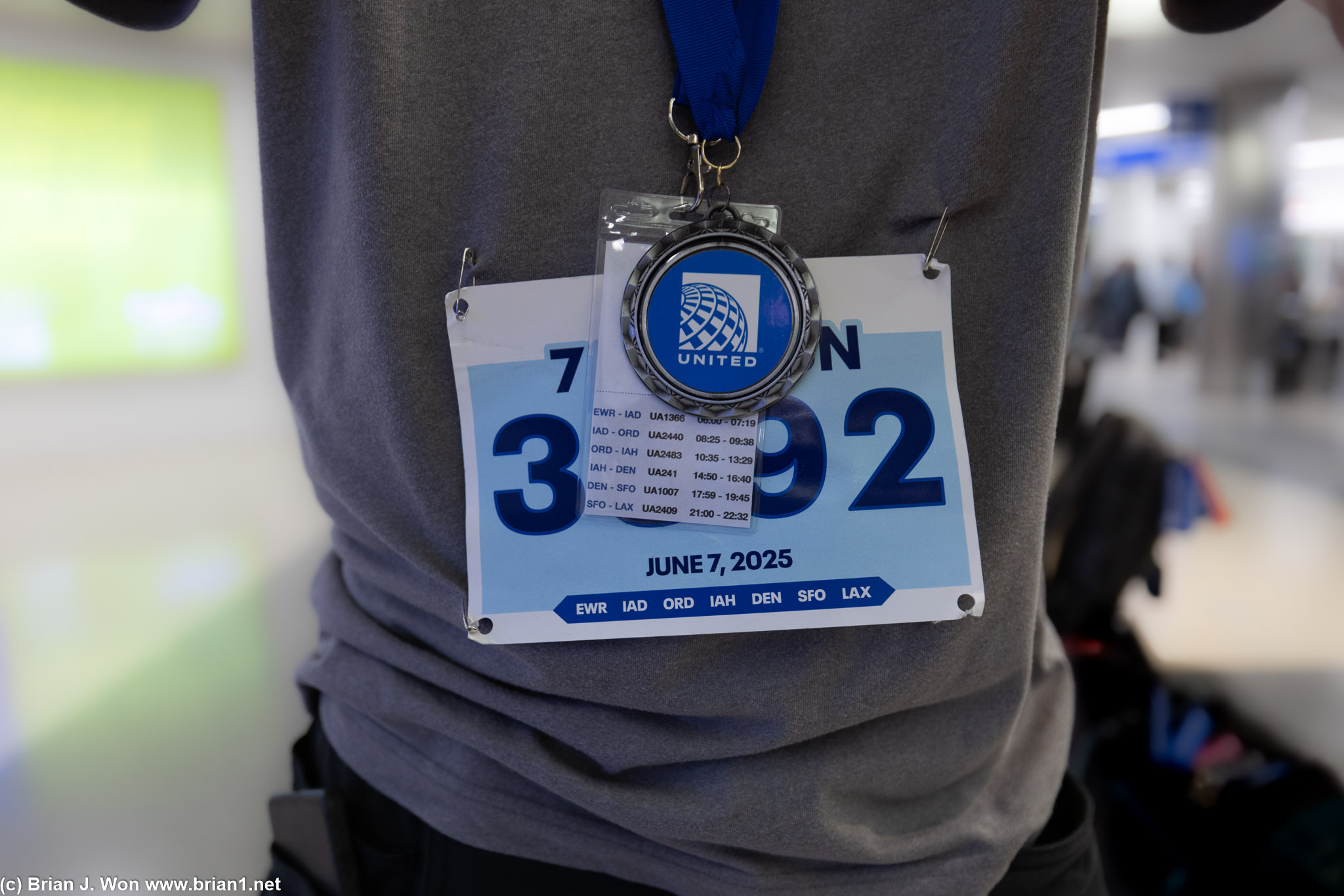 Hub Run bib, lanyard, medal.