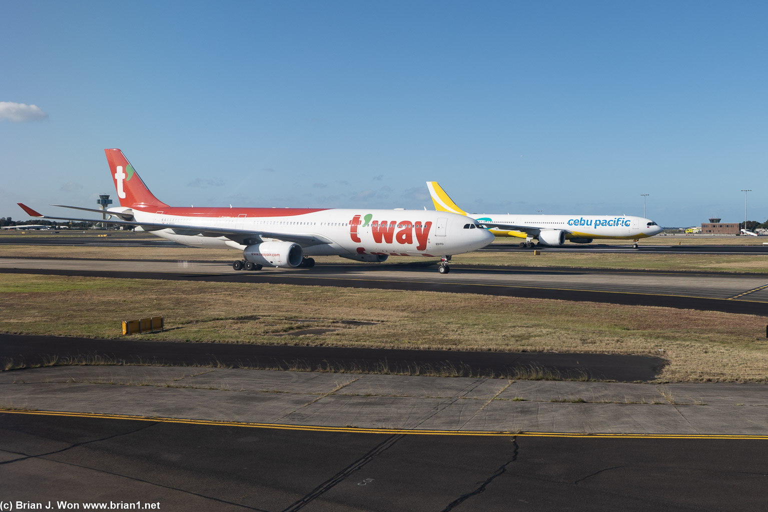 T'way A330 and Cebu Pacific A330neo, the latter on runway 25-07.