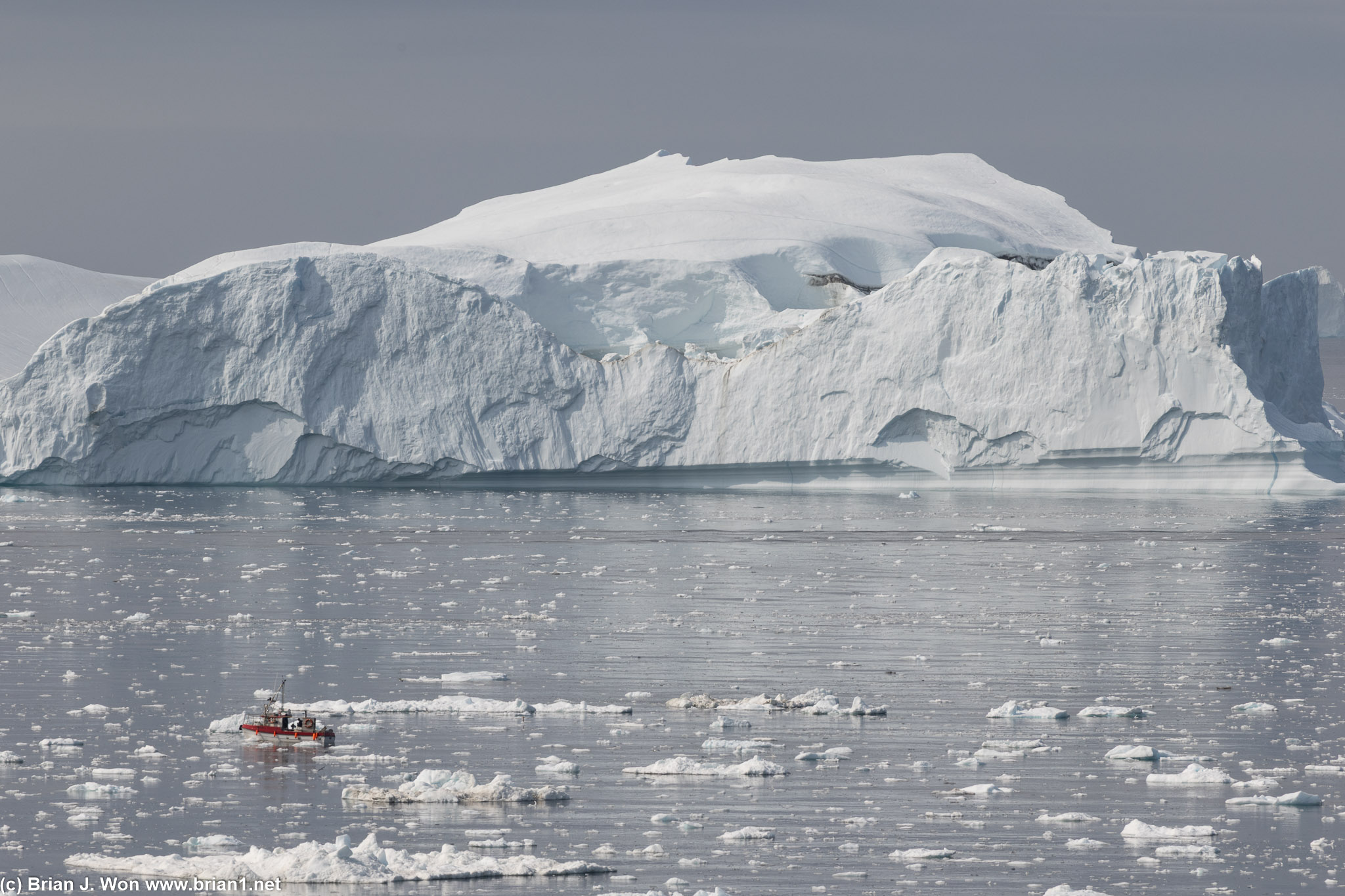 Big iceberg, little boat.