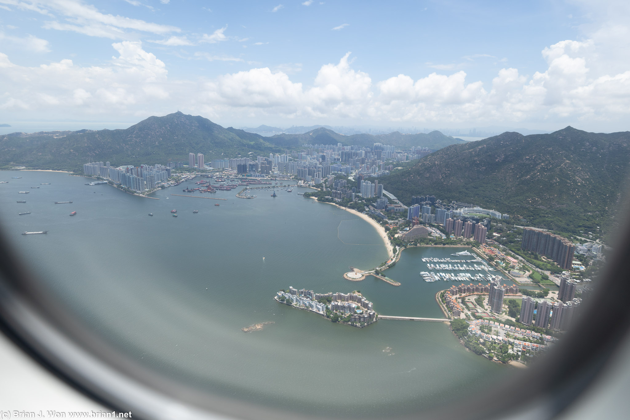 Final approach over Castle Peak Bay.
