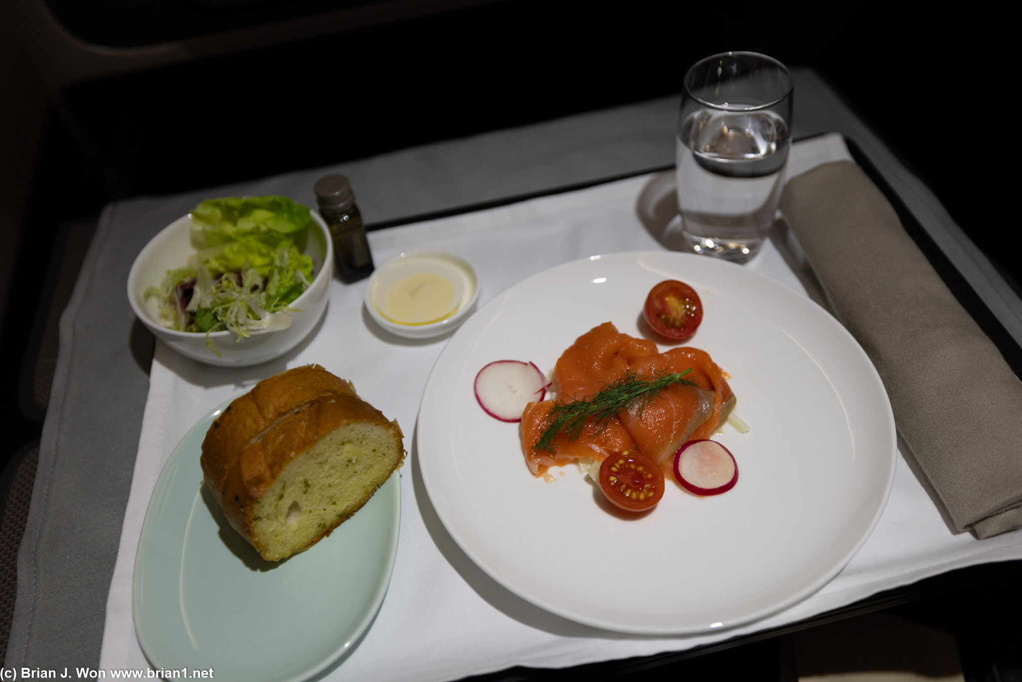 Smoked salmon, salad, garlic bread.