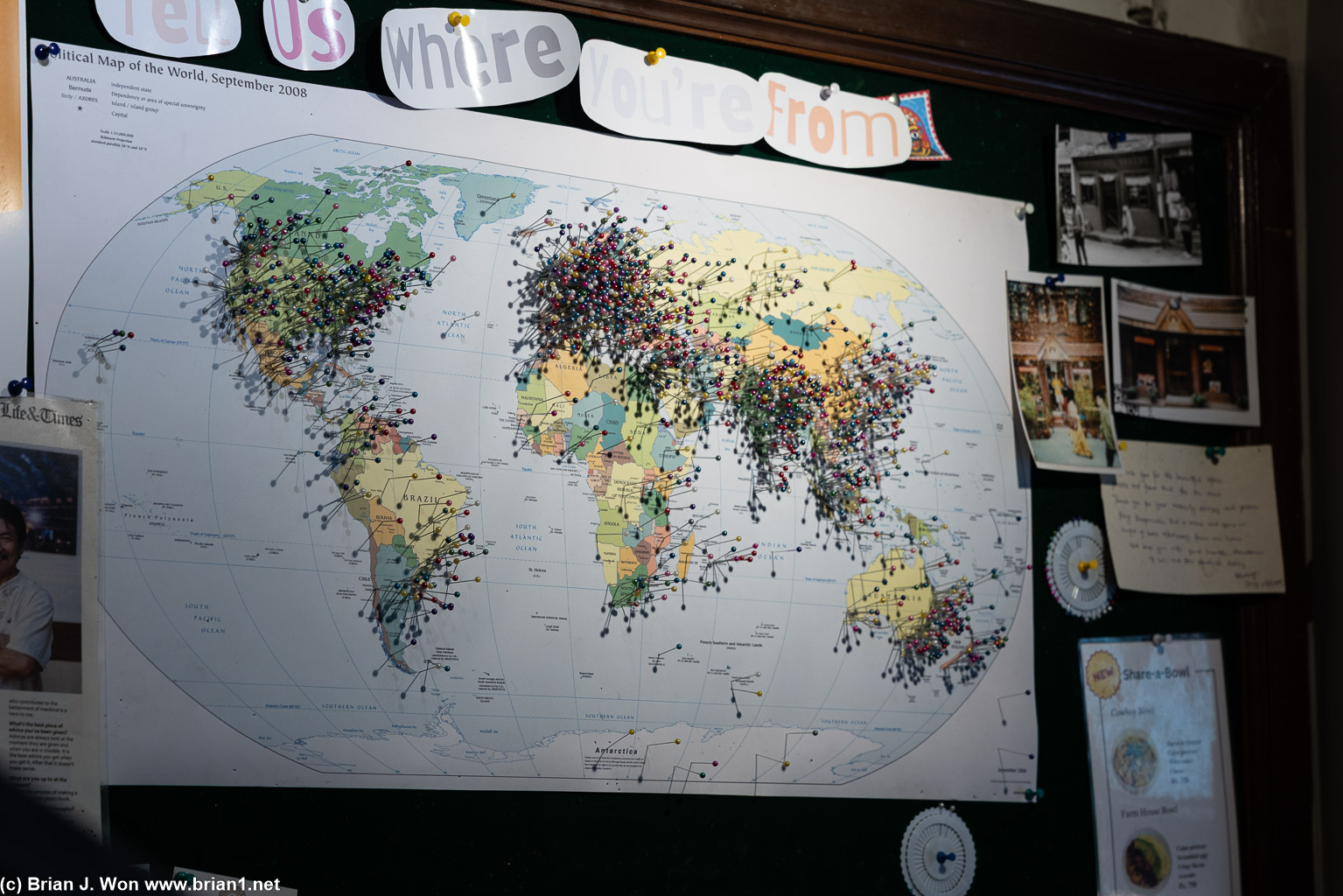 Local bakery/coffee shop has an impressive map of visitors.