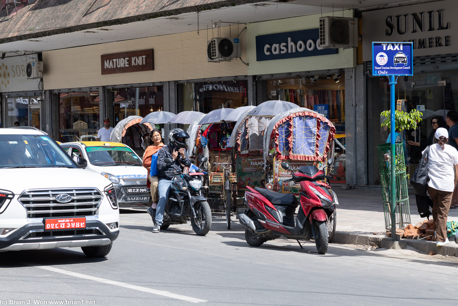 Tuk-tuks.