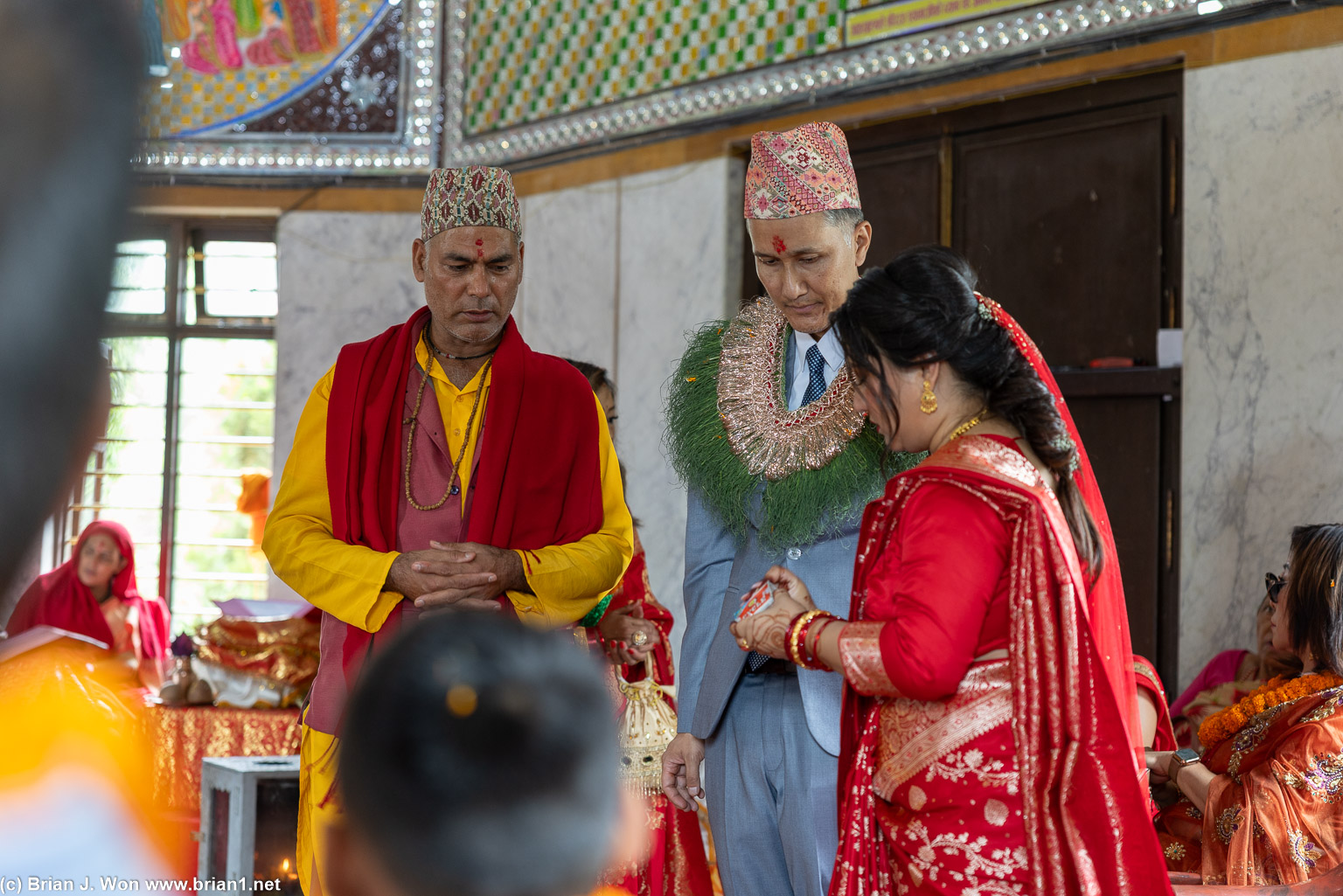 Bhatta with the bride and groom.