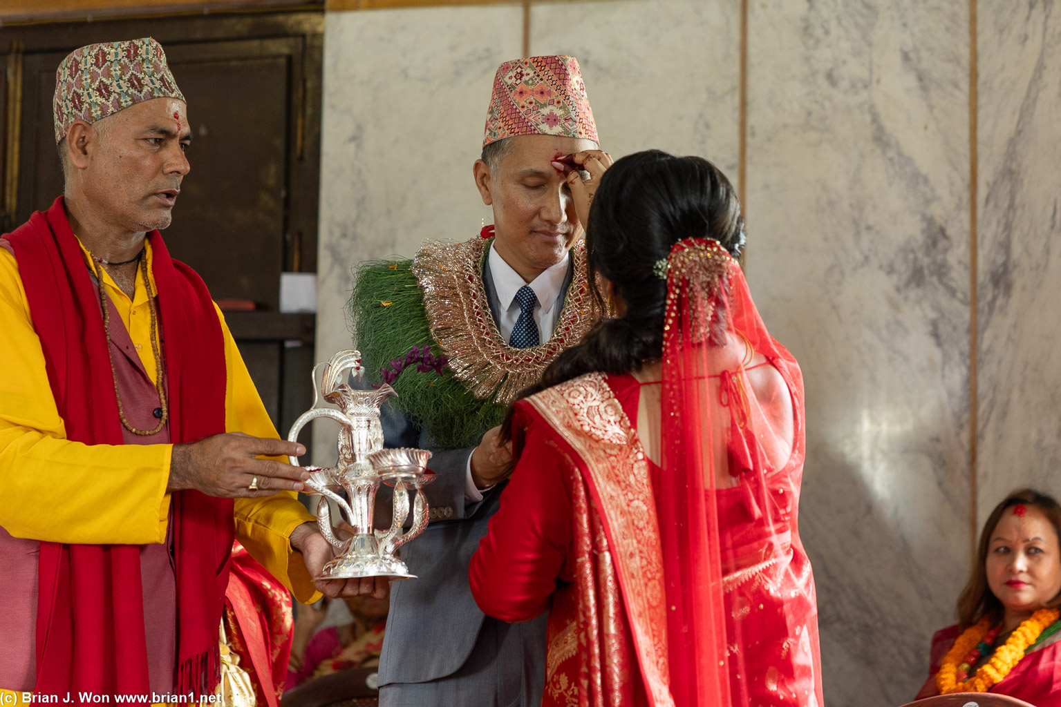 Tika (placing of rice on forehead for blessings).