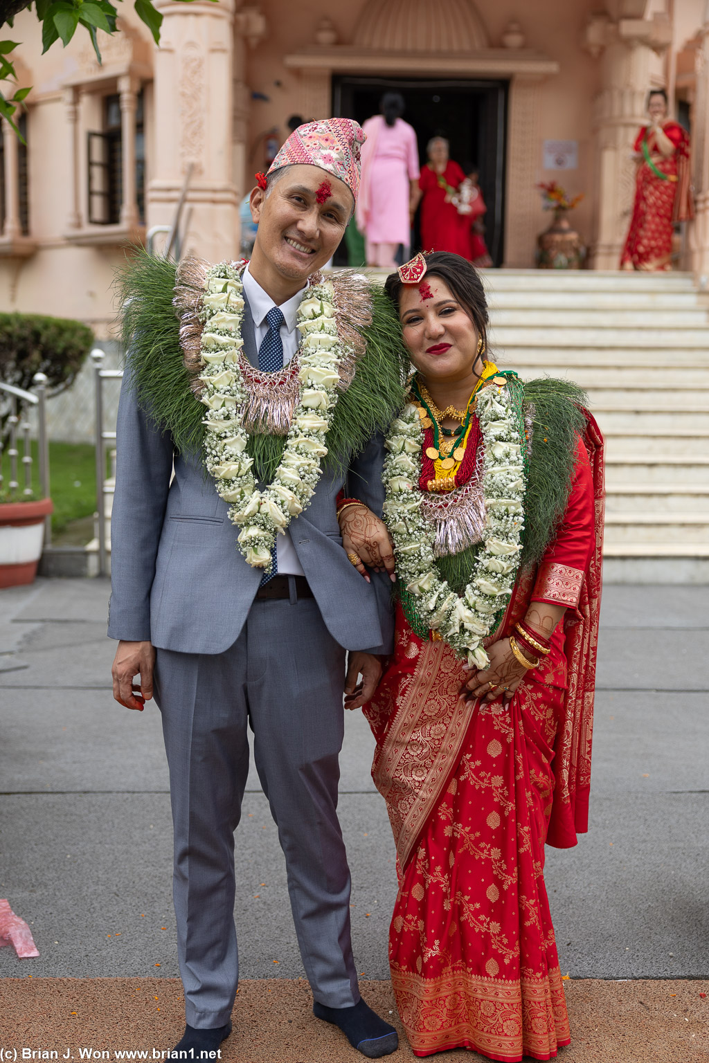 Bride and groom outside the temple.