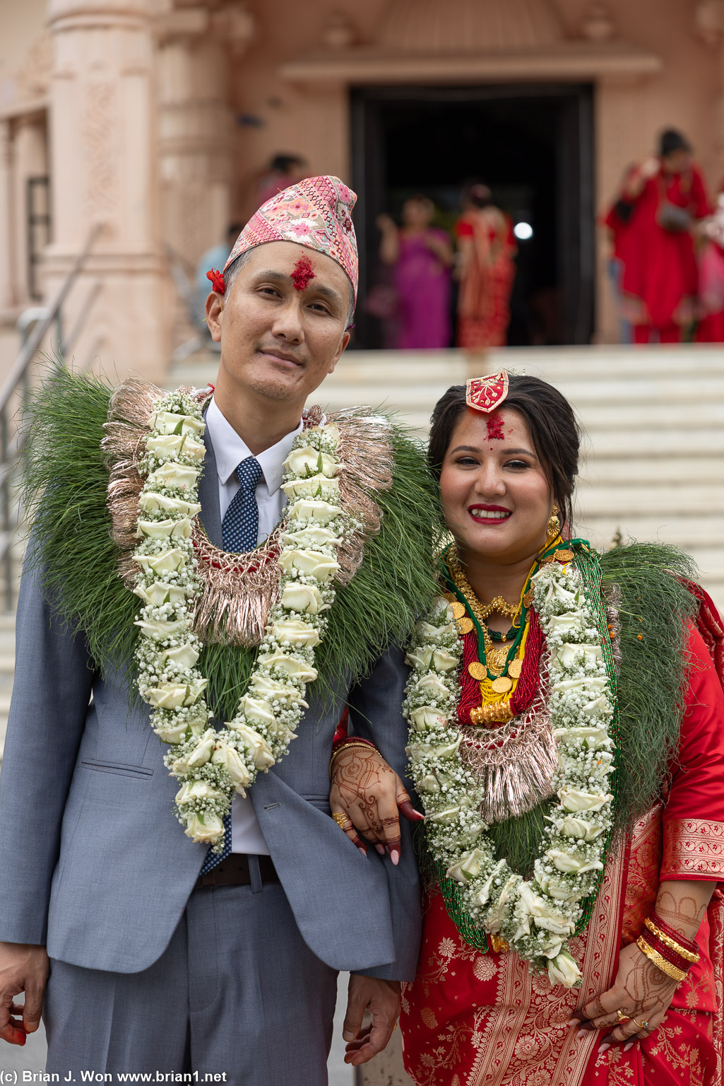 Bride and groom outside the temple.