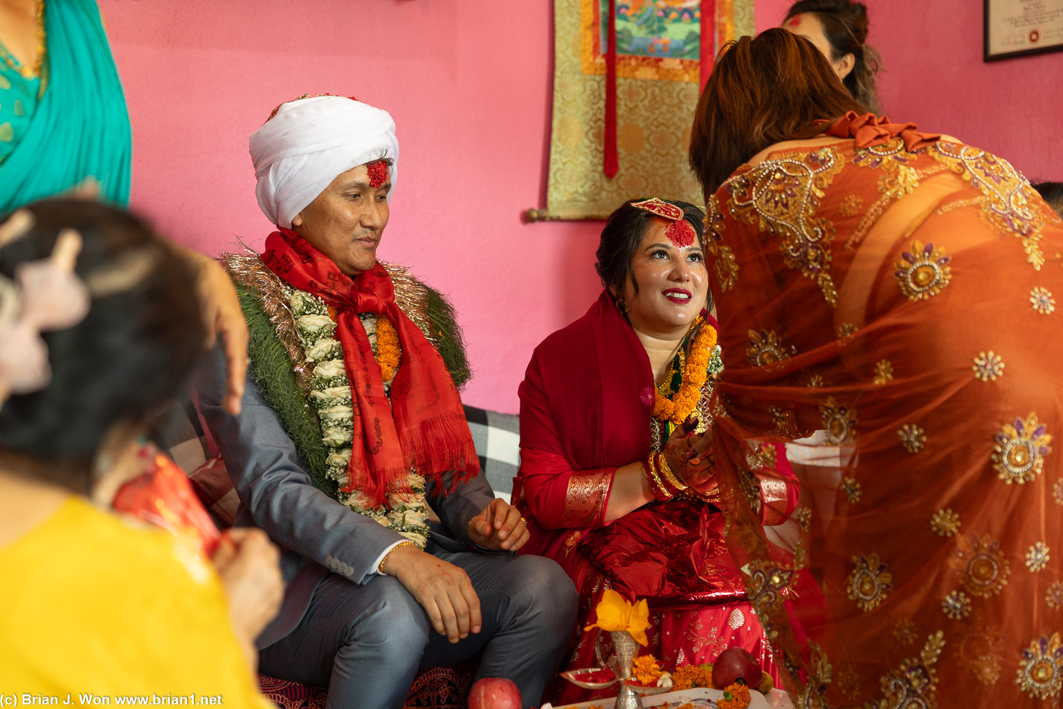 Tika (placing of rice on forehead for blessings).