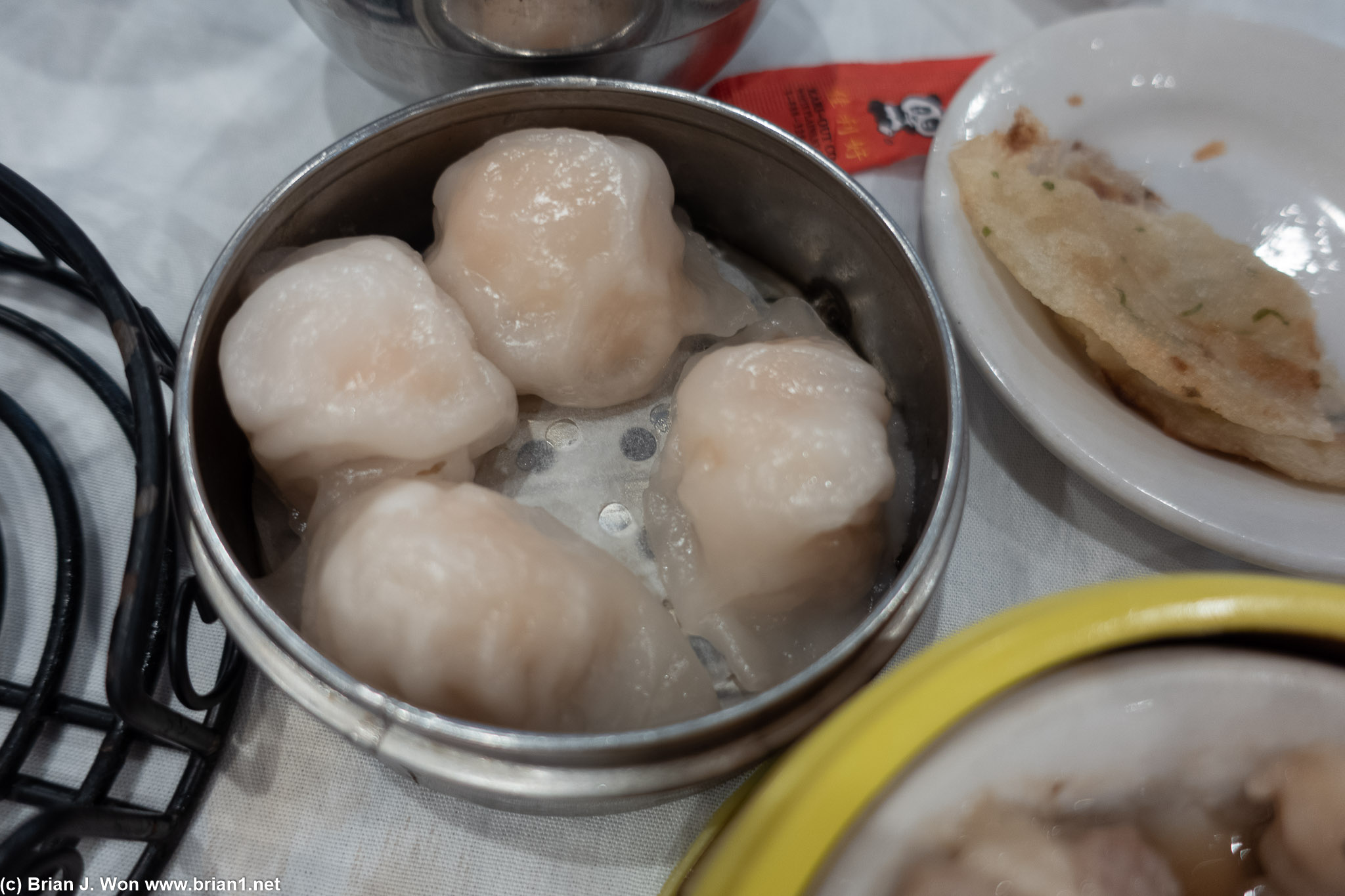 Har gow skins pretending to be translucent, but not enough folds.