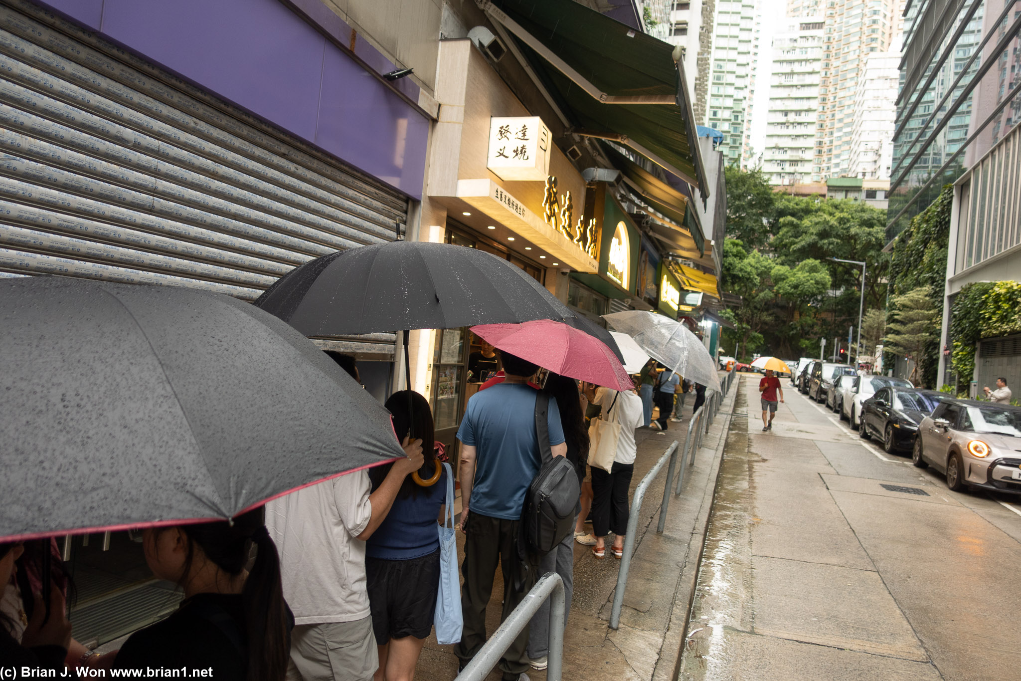 Even in the rain, Fat J Char Siu has a line.