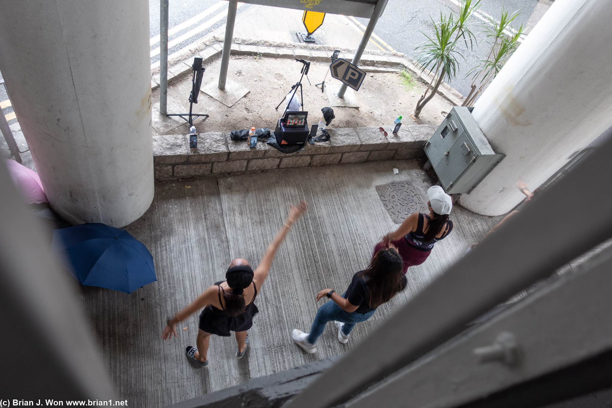 Random workout club outside under one of the pedestrian bridges.