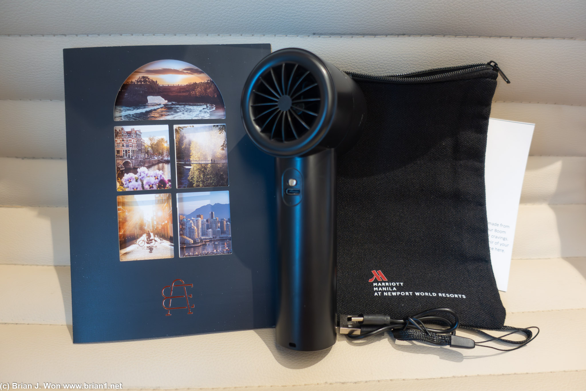 So hot here, another welcome gift is a handheld fan.