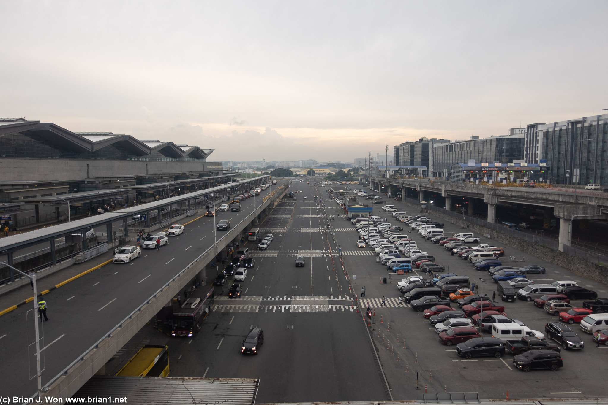 Crossing not just airport access roads (two levels) but a parking lot and a freeway.