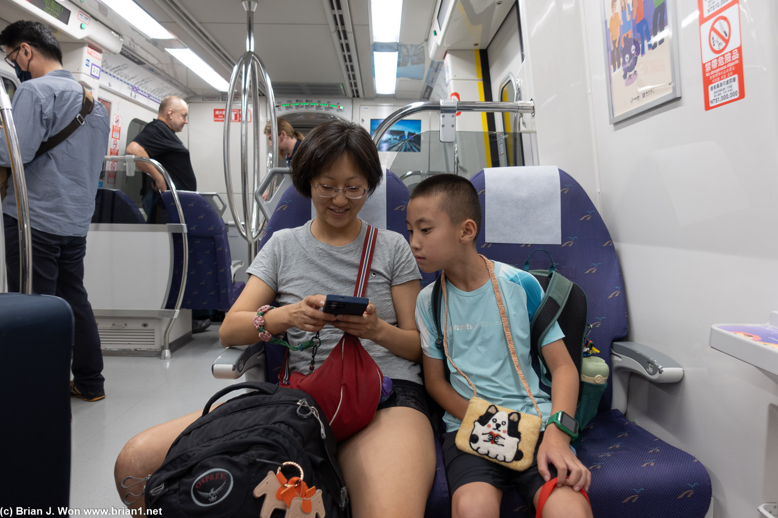 Lan Lan and Lucas on the MRT from the airport.