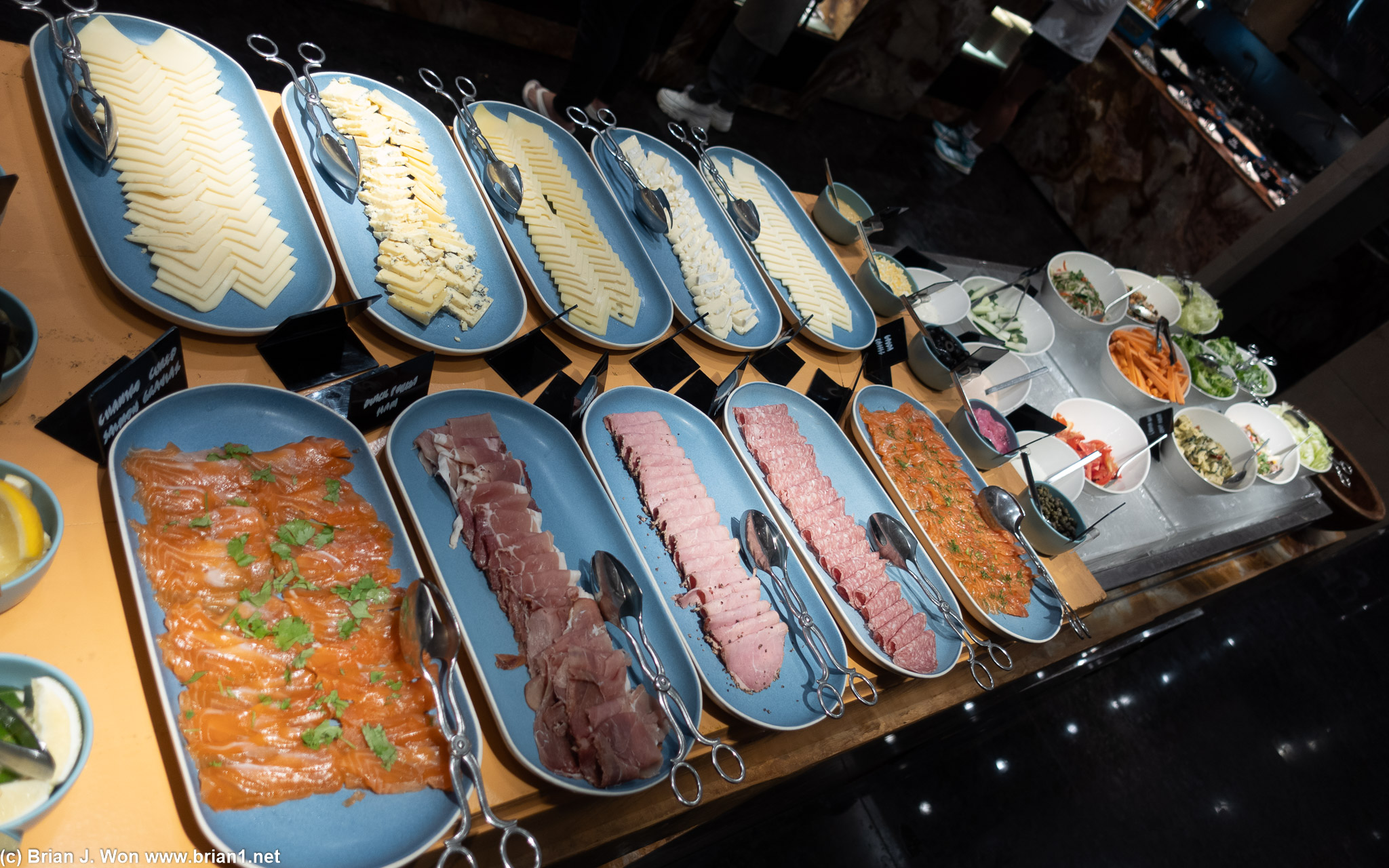 Cold cuts, smoked salmon, and cheeses. Veggies at the end.