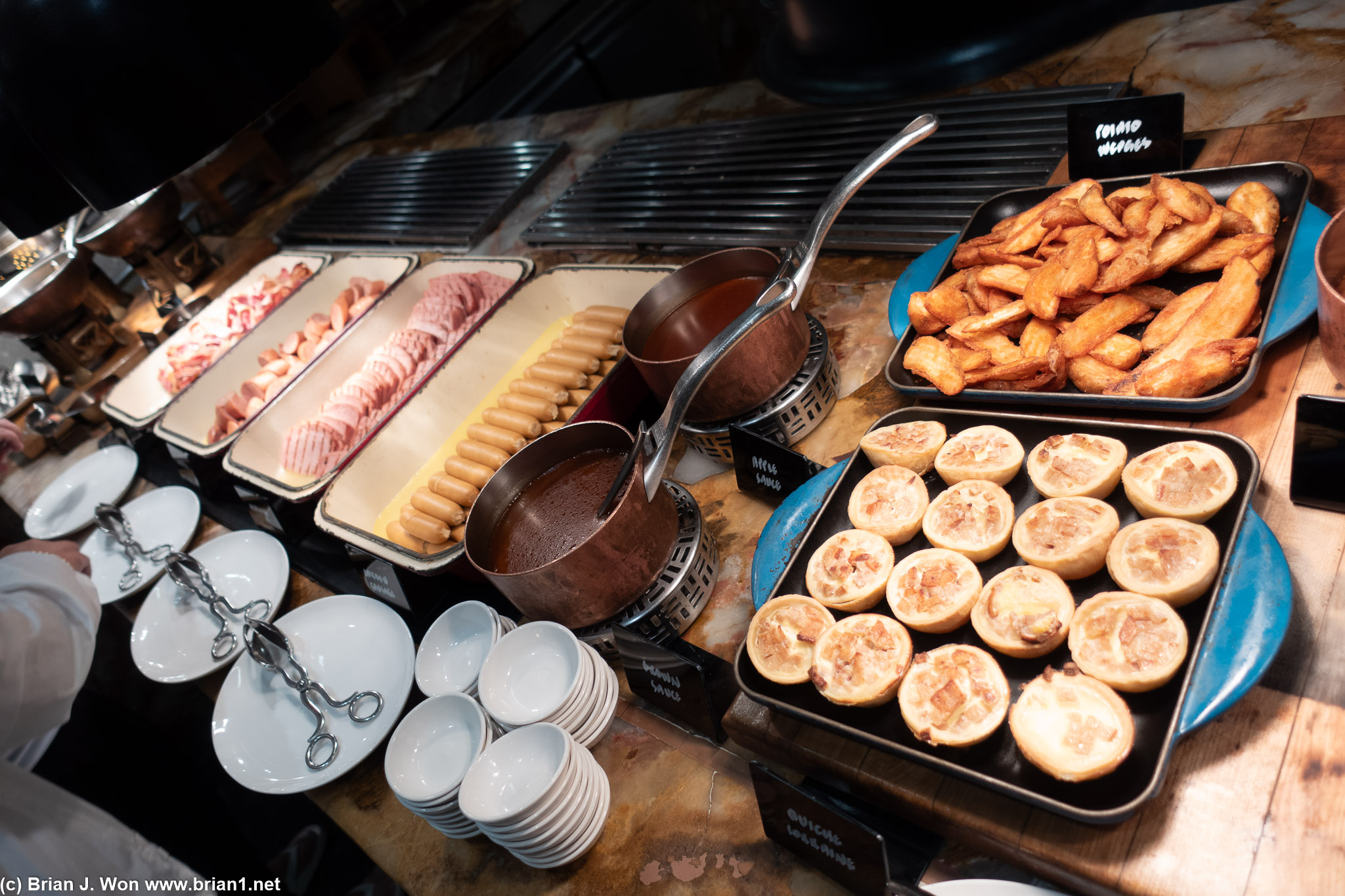 Potato wedges, quiche lorraine, sausage...