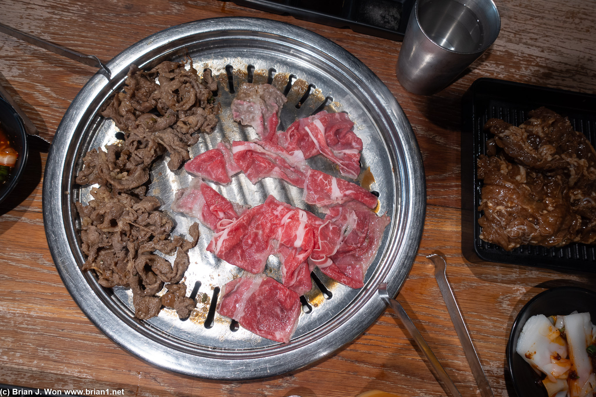 Brisket on the grill, next to bulgogi from the buffet.