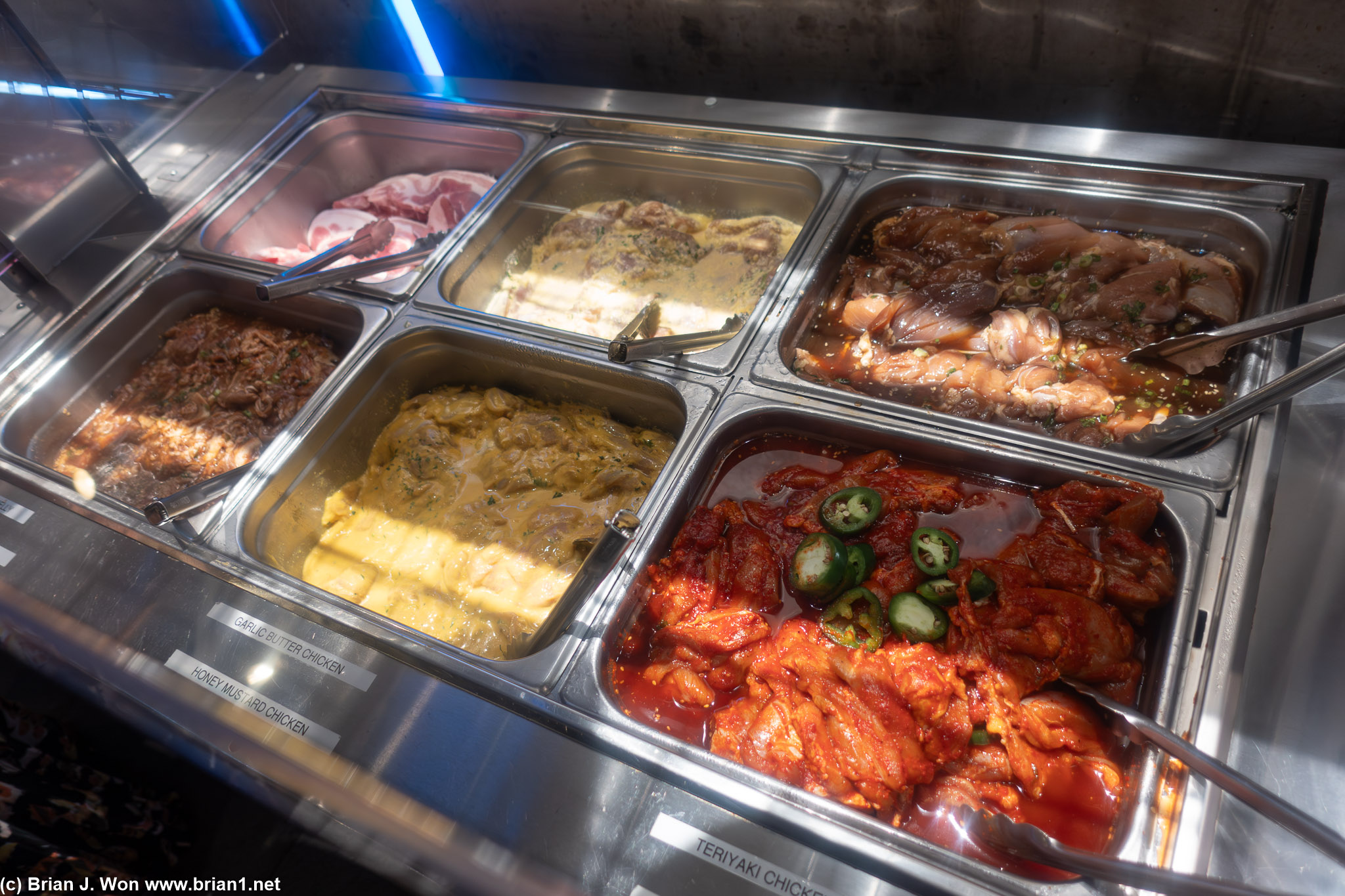 Chicken and pork at the buffet.