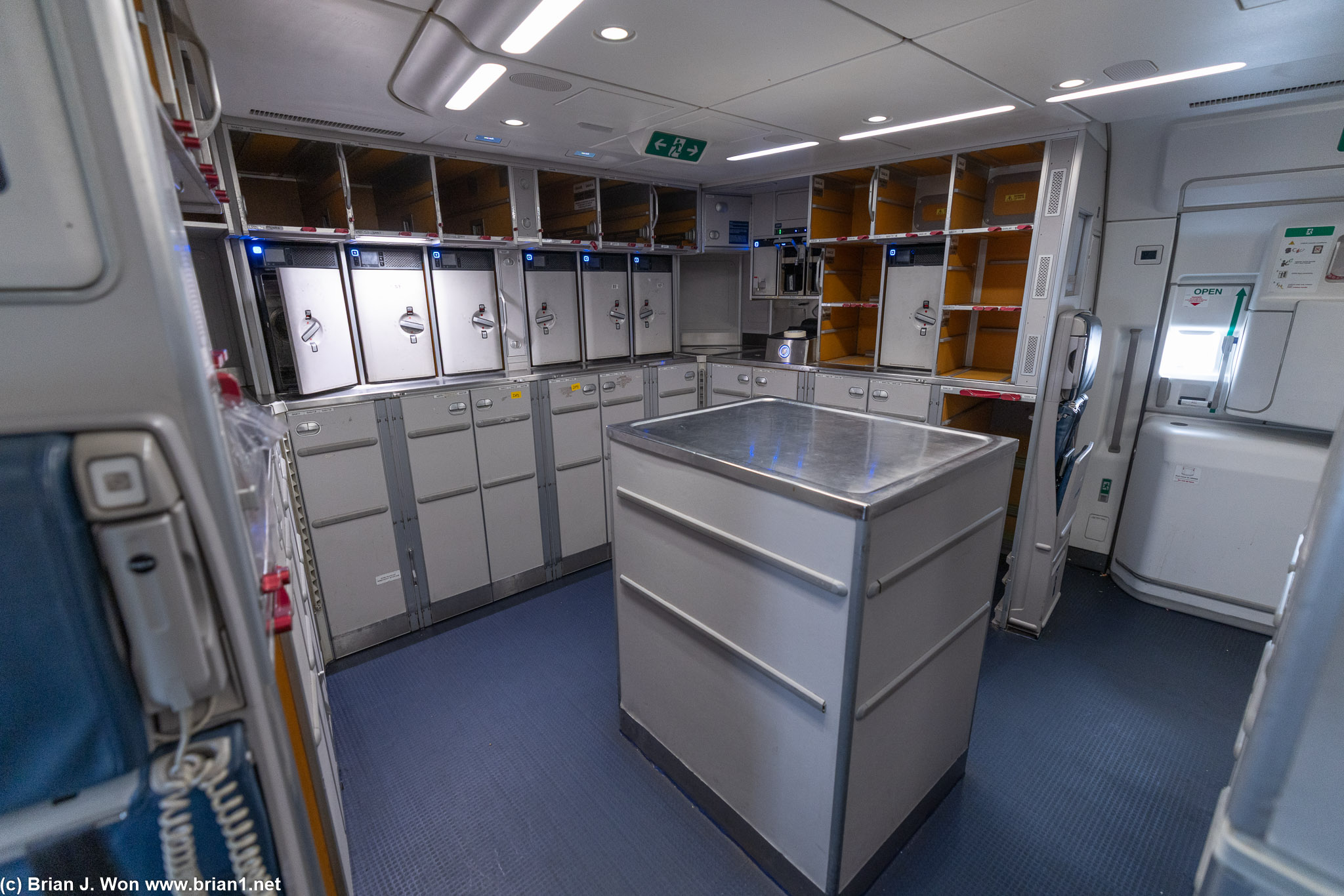 Rear galley being empty not quite as strange, since the ovens and chillers make it look more full.