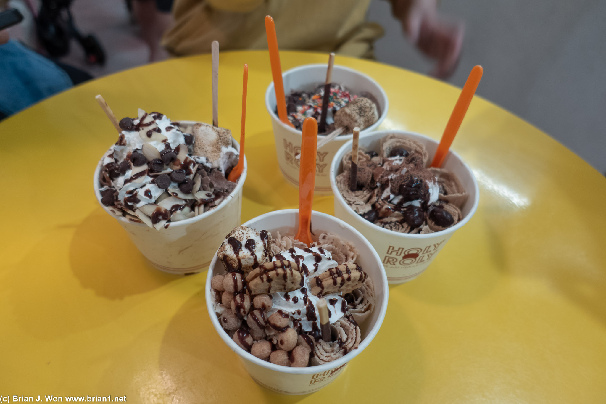 Four different rolled ice creams.